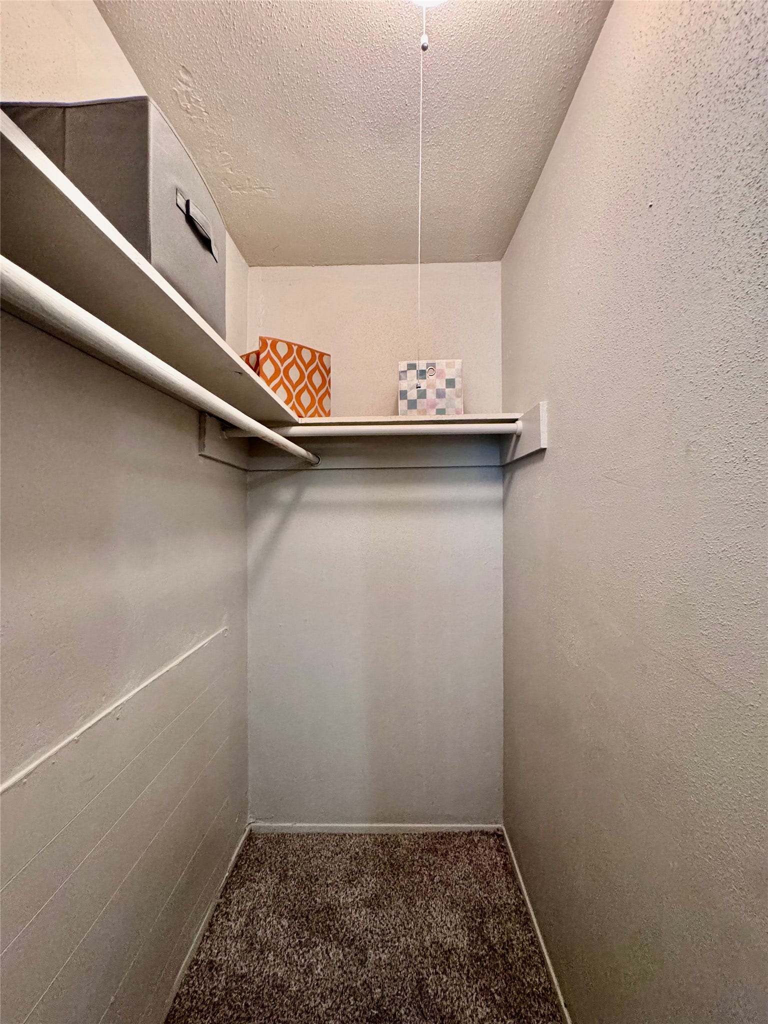 Large walk-in closet in primary bedroom.