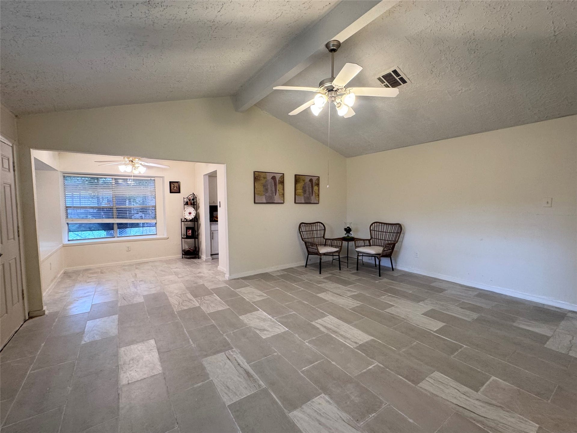 The large living room has high ceilings.The large living room has high ceilings.
