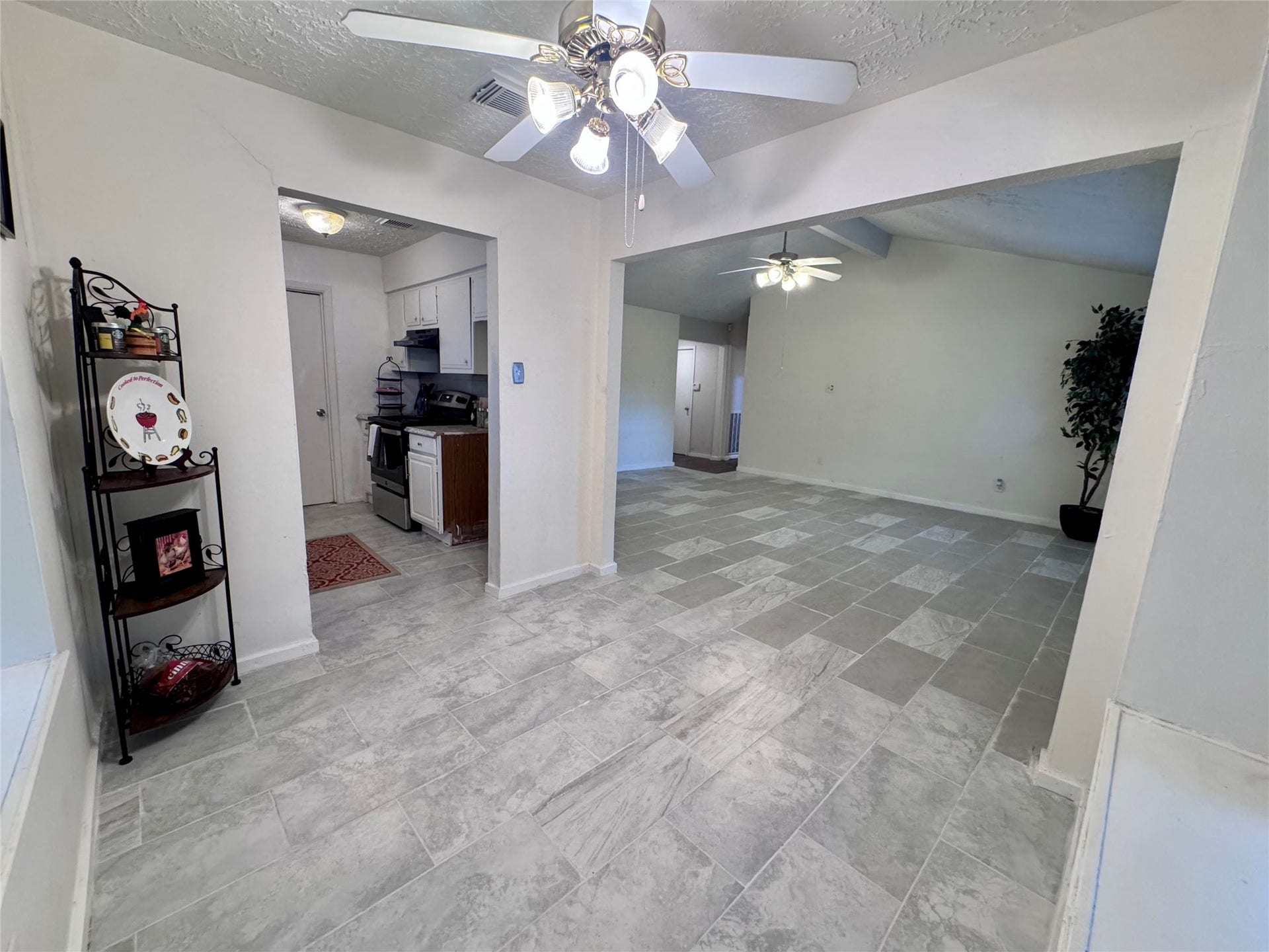 The living room flows nicely into the separate dining area.