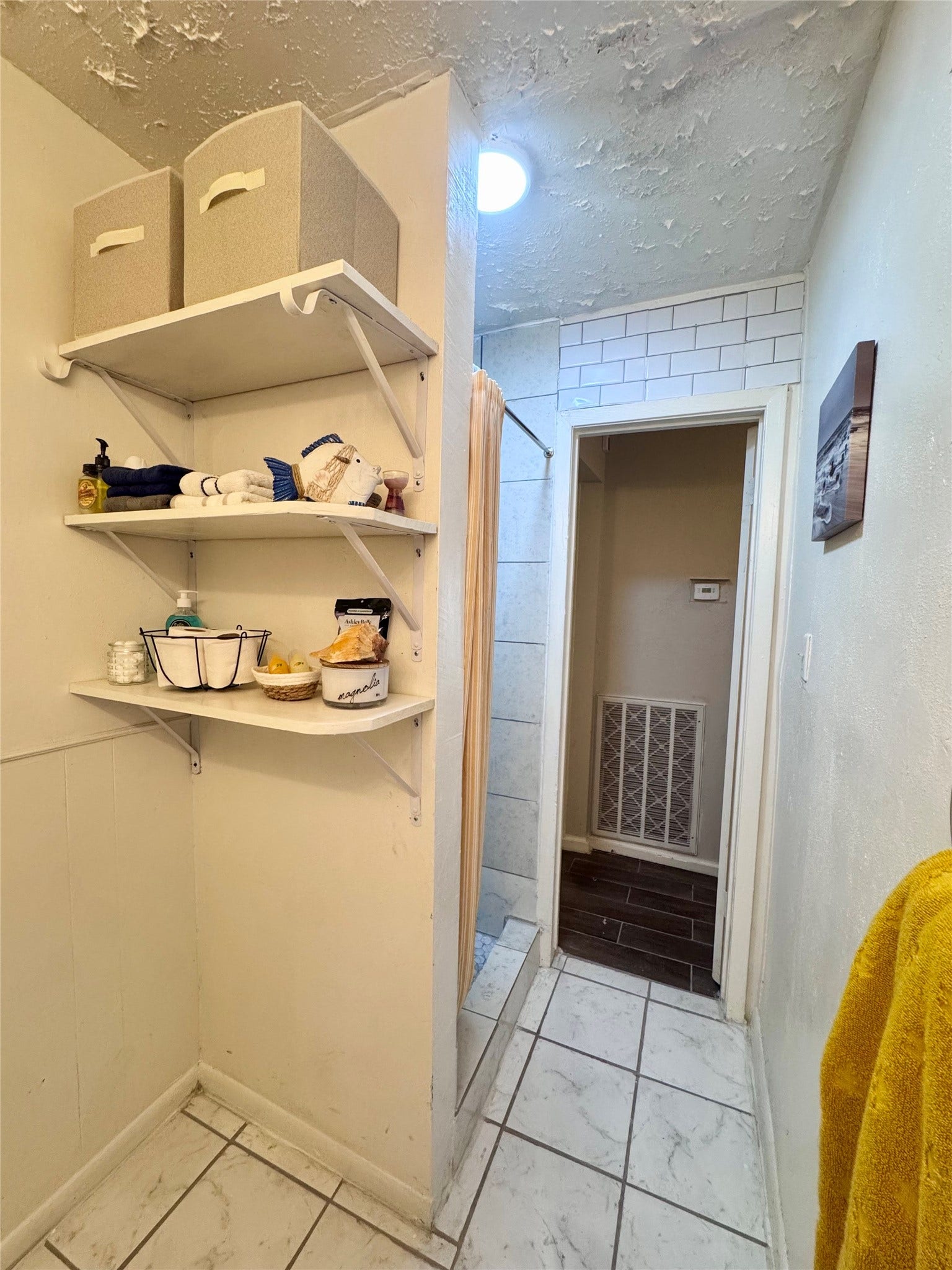 There is built-in shelving for additional storage.