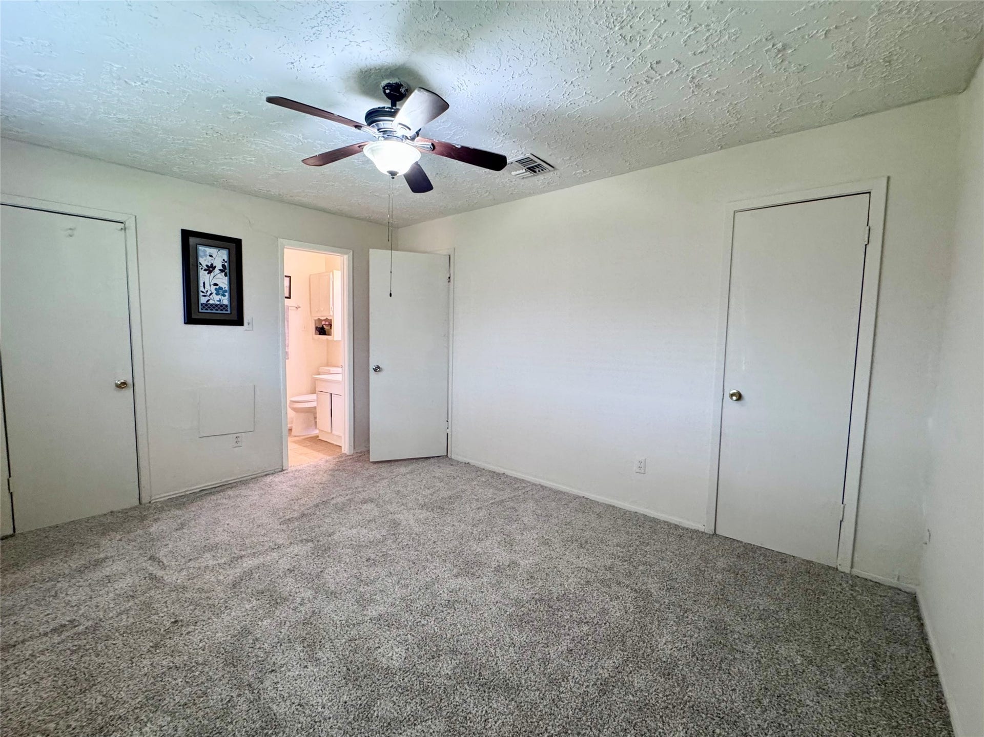 This is the primary bedroom with en-suite bathroom.