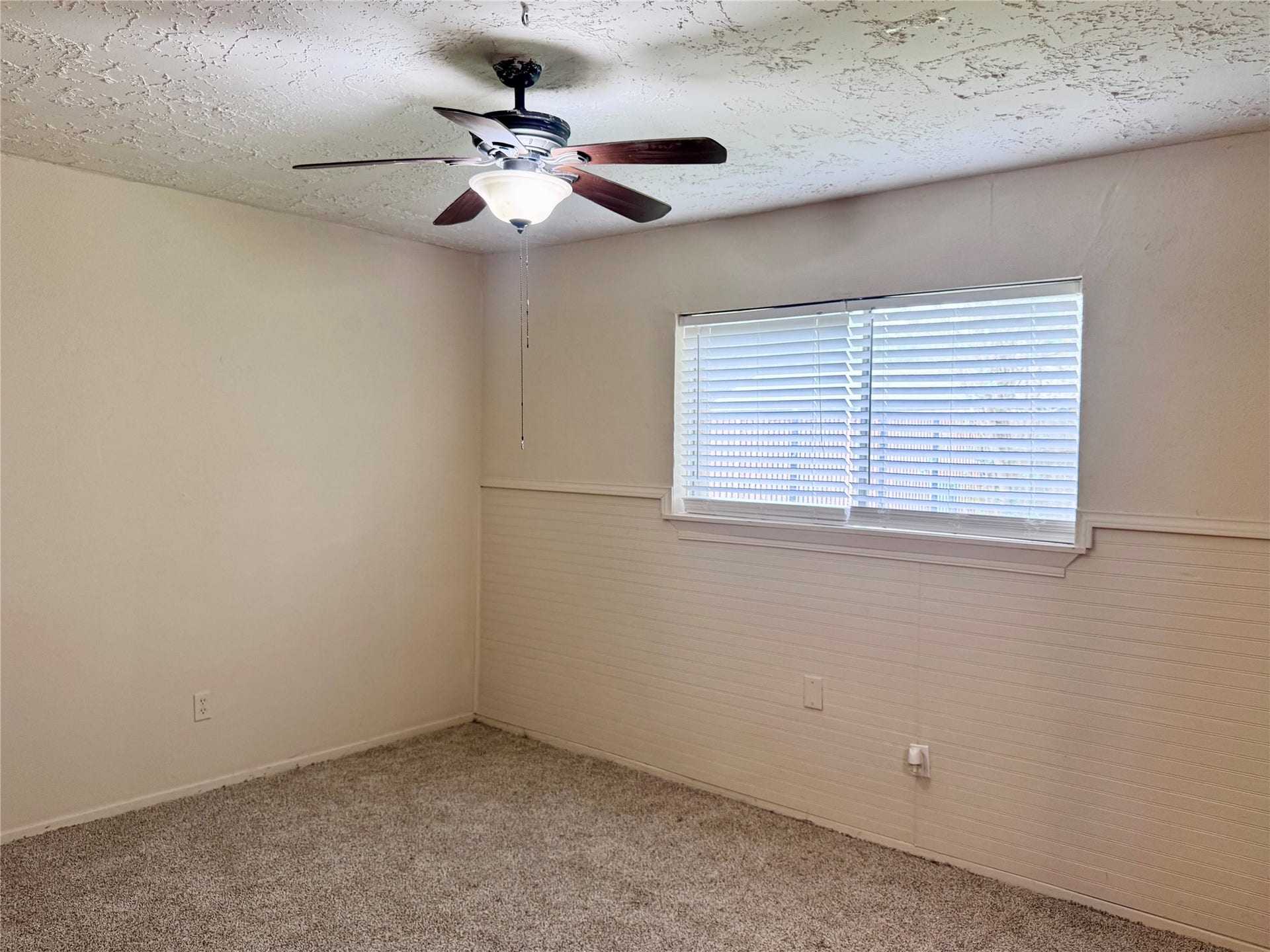 Another view of the primary bedroom.