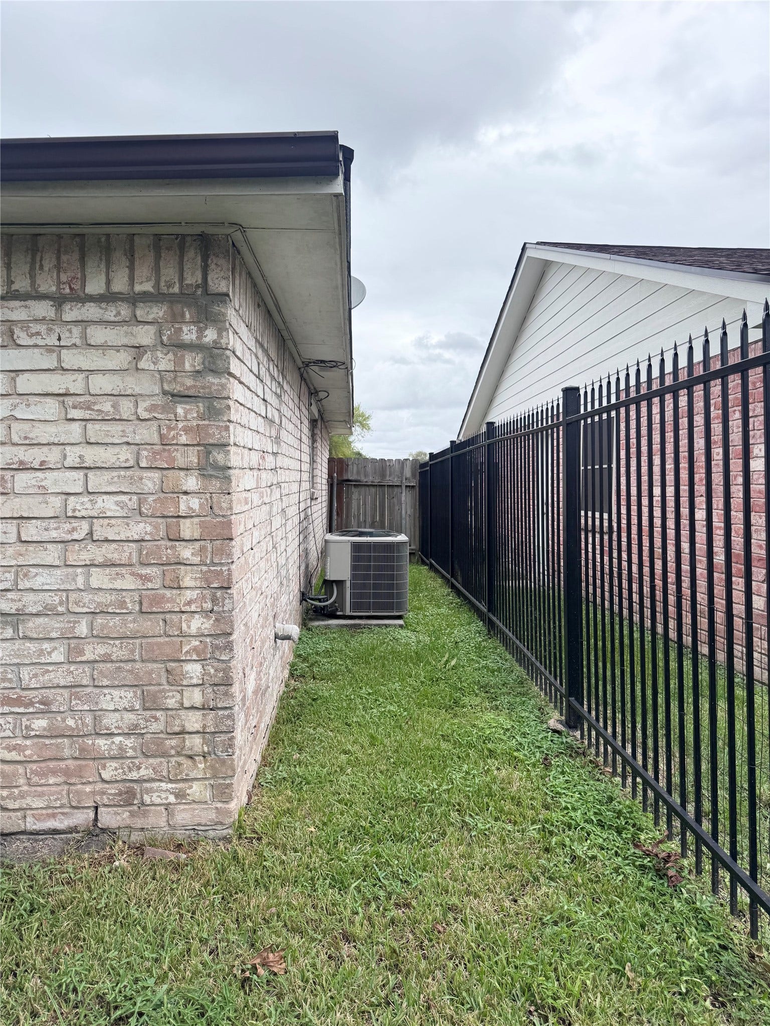 AC Unit is located on the side of the home.
