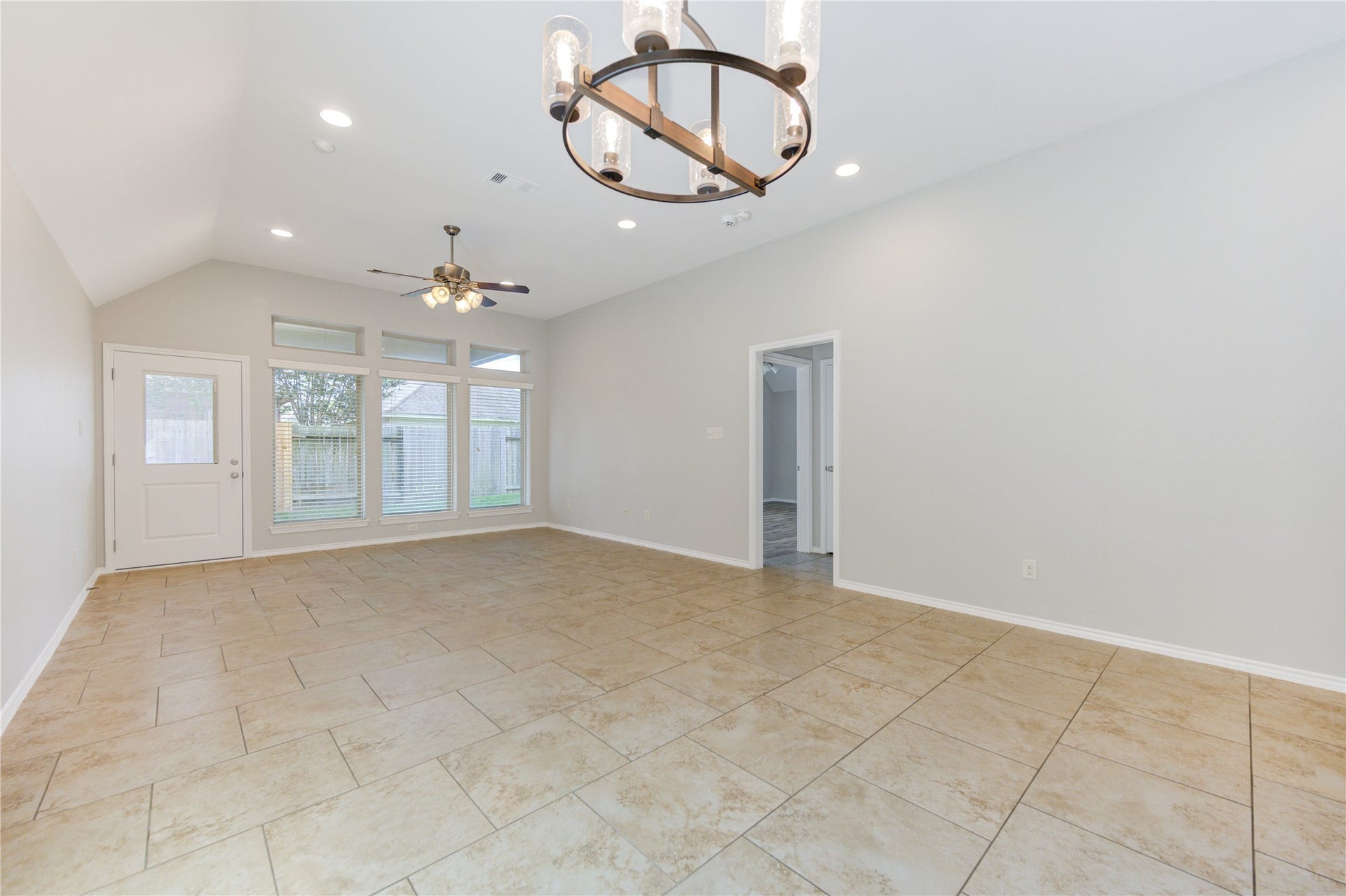 27407 Gatlin Lane, Spring, TX 77386 Spacious room with vaulted ceilings and plush carpet, full of possibility. A blank slate awaiting your vision.