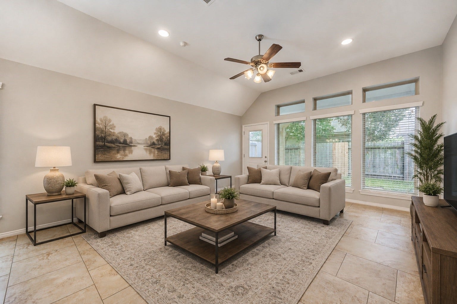 27407 Gatlin Lane, Spring, TX 77386 Open, airy living room layout with oversized windows and abundant natural light; furnishings shown are virtually staged. A flexible canvas for your personal style.