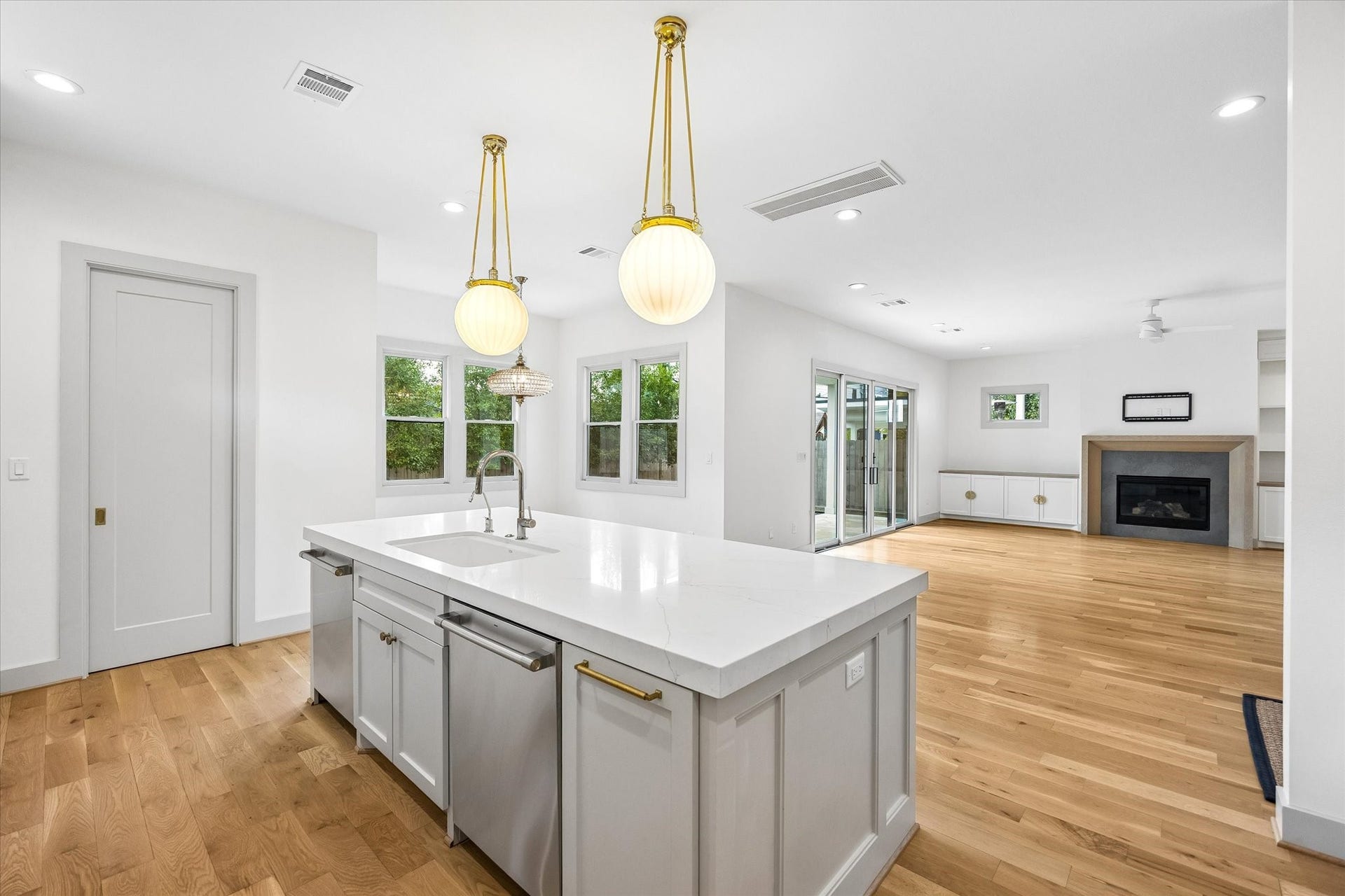 704 Teetshorn Street, Houston, TX 77009 A wide-open first-floor layout connects the living room, kitchen and dining spaces for comfortable everyday living and entertaining.