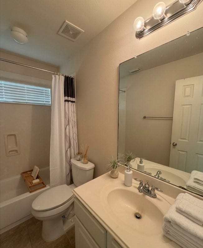 21723 Saragosa Pond Lane, Spring, TX 77379 Stylishly staged bathroom showcasing potential for modern updates and personalized touches.