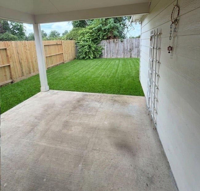 21723 Saragosa Pond Lane, Spring, TX 77379 Charming covered patio overlooking a lush, spacious lawnideal for relaxation and entertaining.