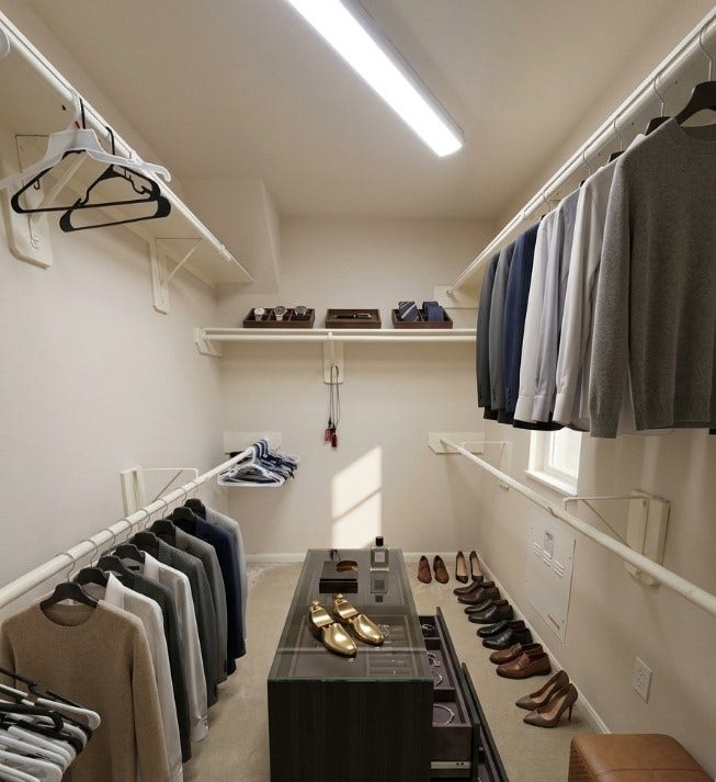 21723 Saragosa Pond Lane, Spring, TX 77379 Spacious walk-in closet, thoughtfully staged to inspire organization and style.
