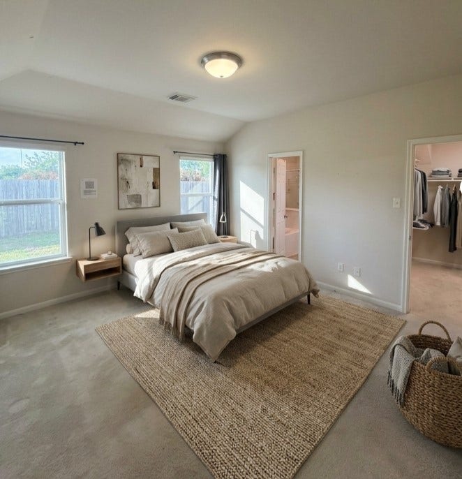 21723 Saragosa Pond Lane, Spring, TX 77379 Spacious primary bedroom elegantly staged to inspire your dream retreat.