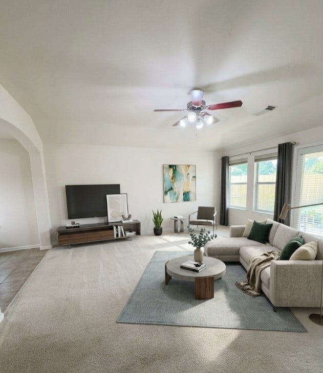 21723 Saragosa Pond Lane, Spring, TX 77379 Spacious living room with modern virtual staging, offering a glimpse of stylish possibilities.