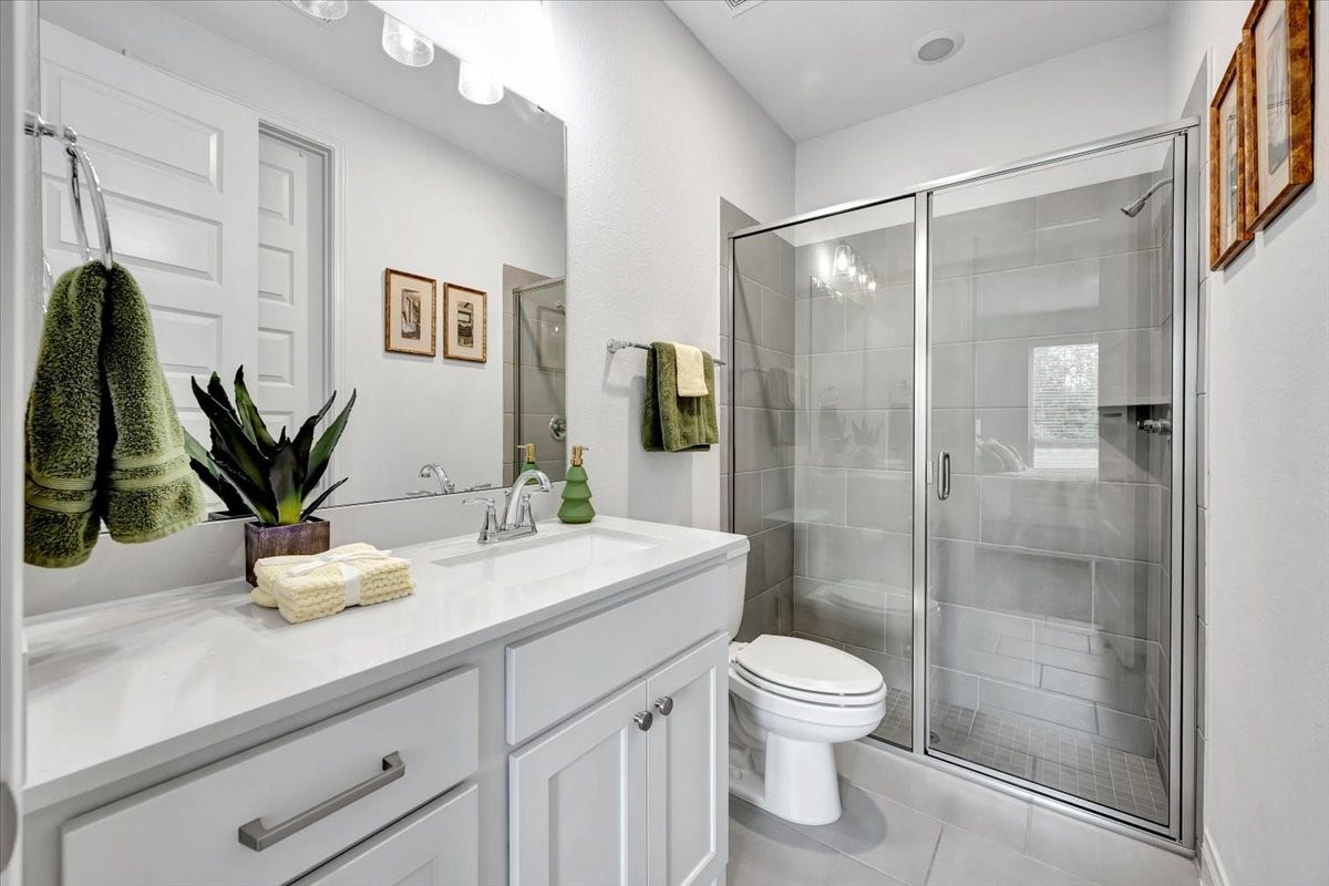 12218 Hickory Arroyo Drive, Humble, TX 77346 Guest bathroom downstairs with shower