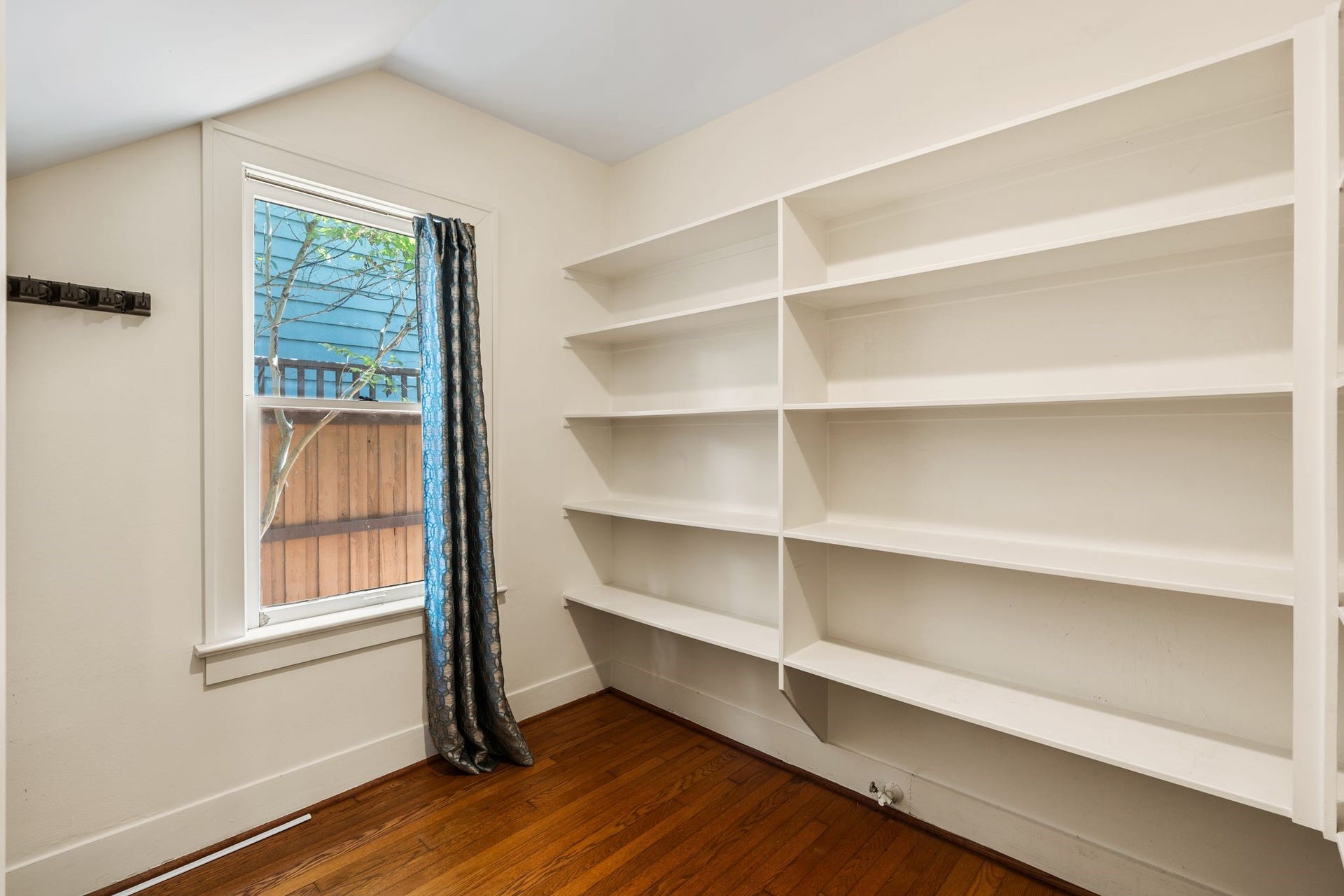 The kitchen also features a large walk-in pantry.