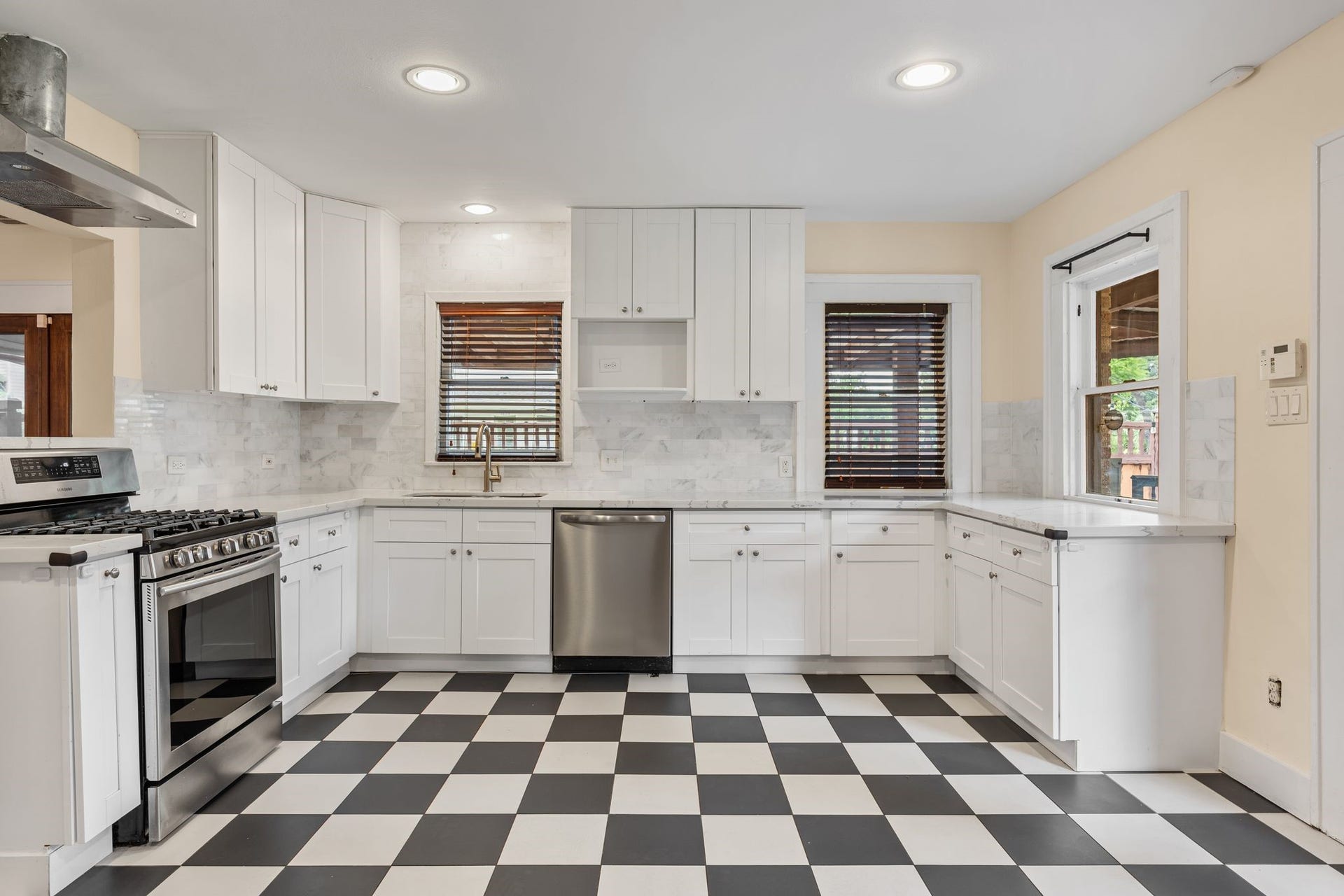 The family chef will love the updated kitchen which features quartz counter tops, stainless steel appliances and lots of storage.
