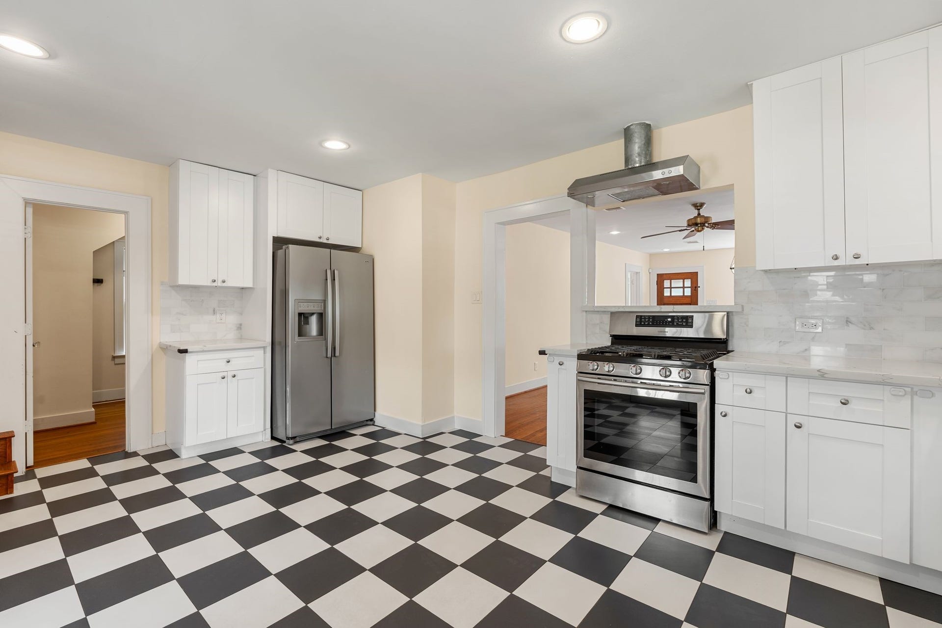 The spacious kitchen opens to the living and dining space which works well for entertaining and family living.