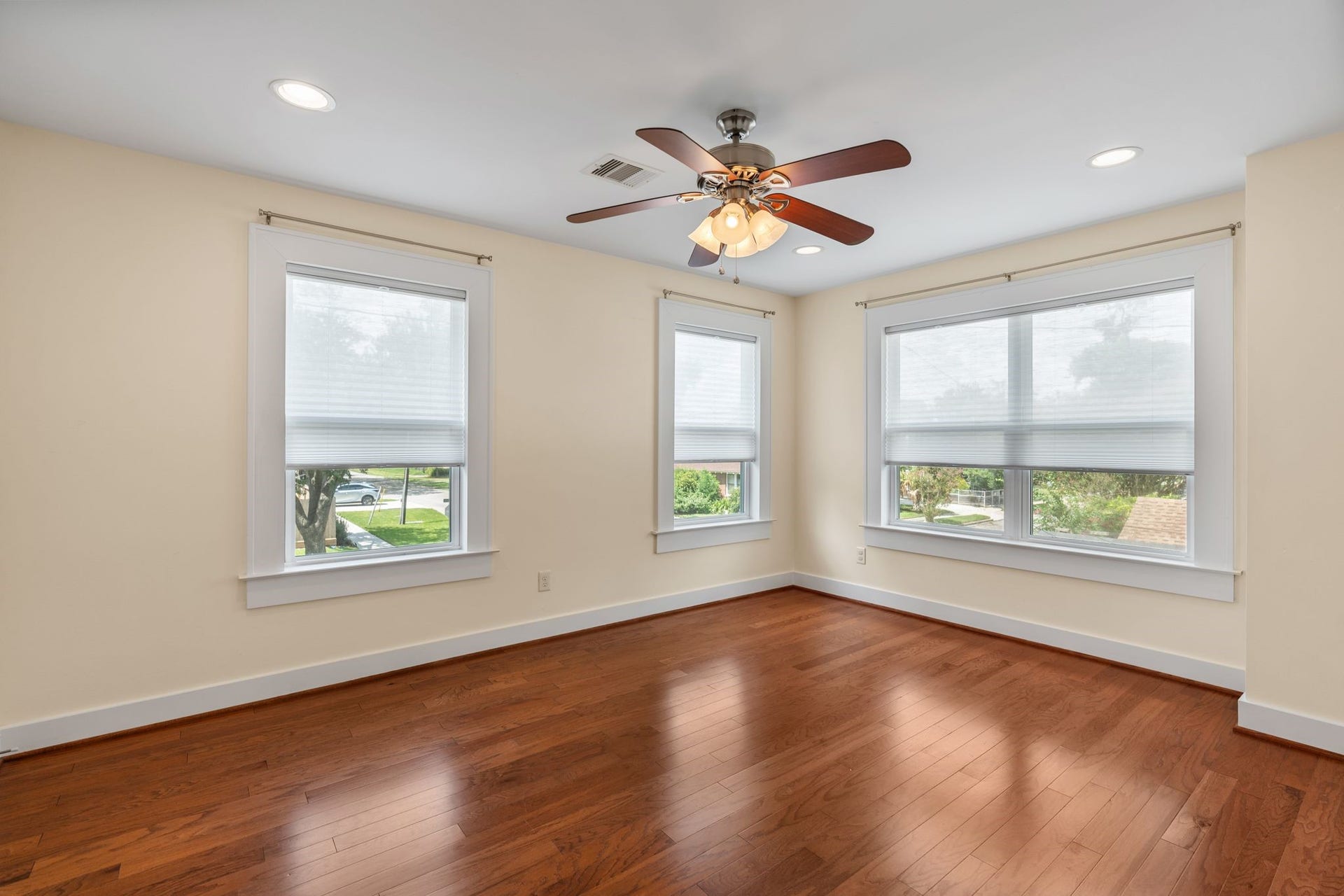 Bedroom # 3 on the second floor with wood floors and lots of natural light.
