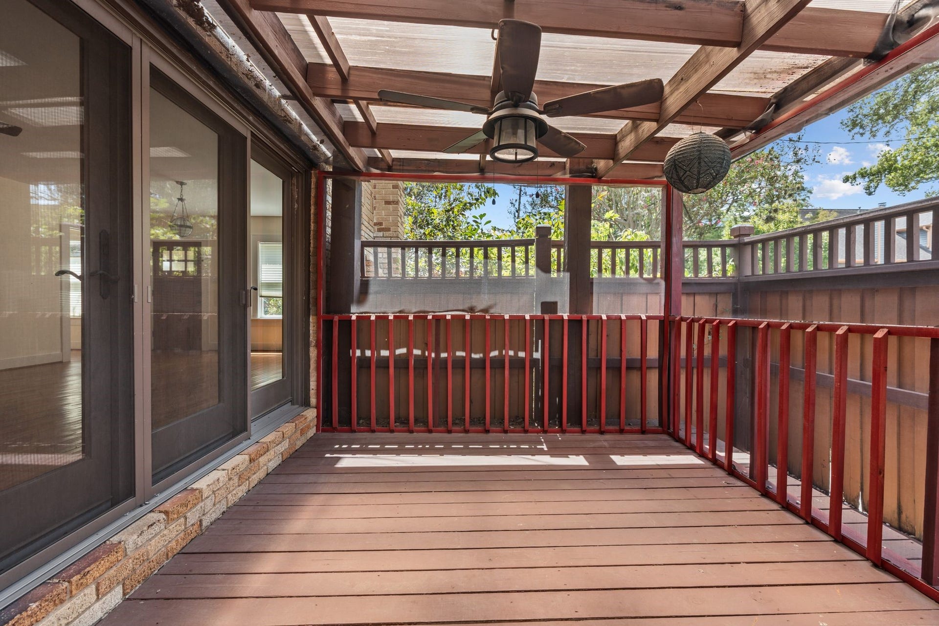 A portion of the back yard deck is screened.