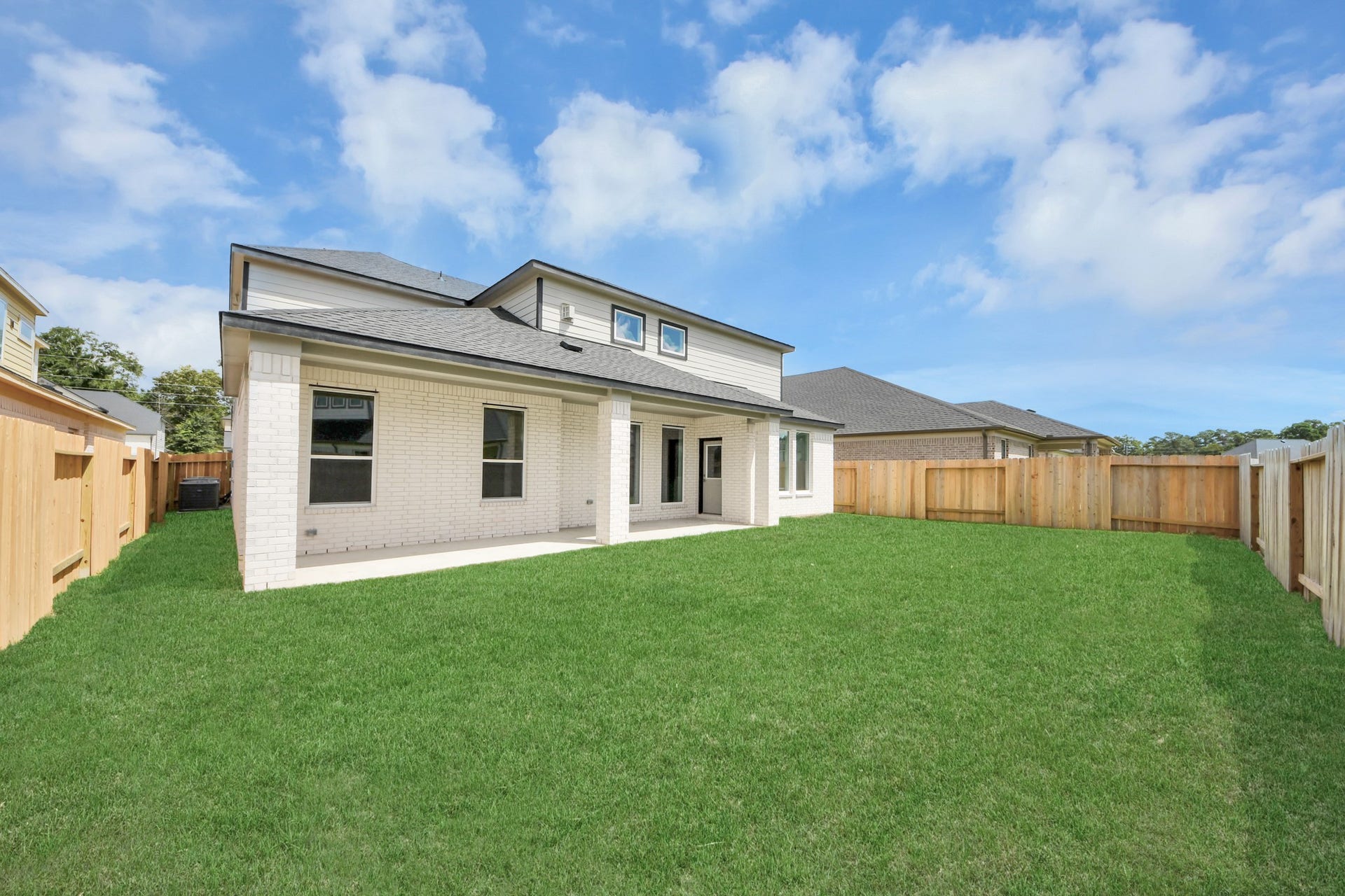 3221 Skerne Spring Drive, Spring, TX 77373 Backyard retreat, offering an abundance of space for kids to play and explore. The possibilities are endless in this outdoor haven, where the joy of open-air activities and family gatherings awaits. Sample photo of completed home with similar floor plan. Actual colors and selections may vary.