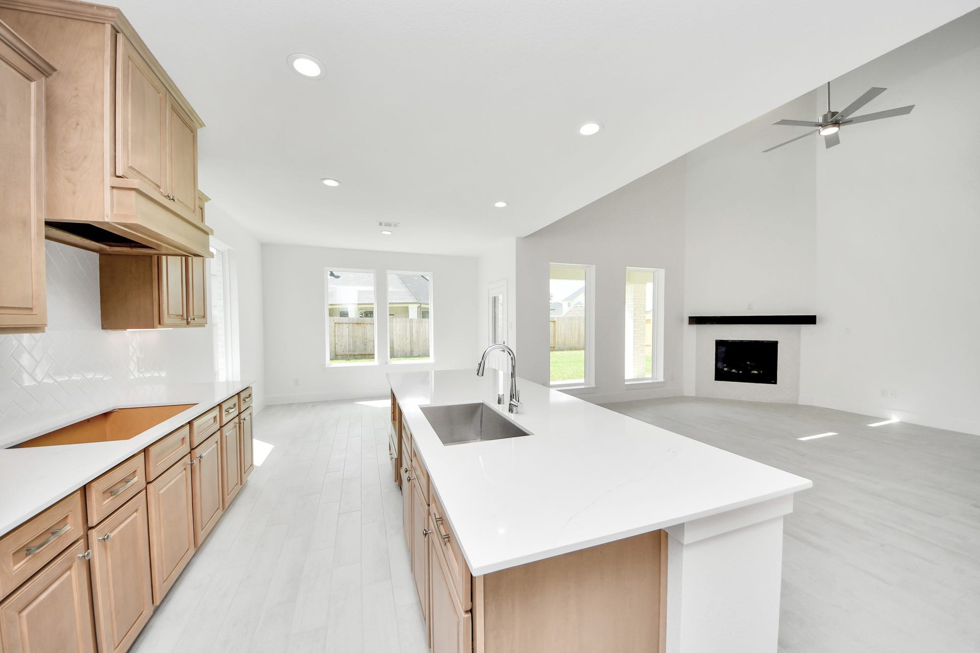 3221 Skerne Spring Drive, Spring, TX 77373 This generously spacious kitchen is a dream realized! Sample photo of completed home with similar floor plan. Actual colors and selections may vary.