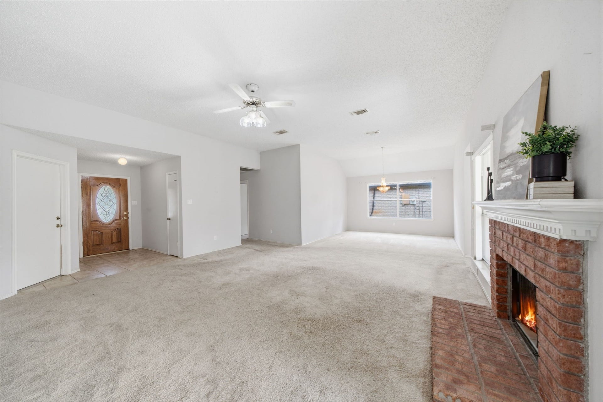 707 Laurel Grove Lane, Pearland, TX 77584 Spacious den with cozy fireplace
