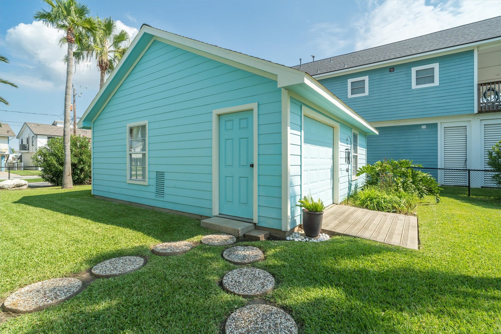 276 Barracuda Street, Bayou Vista, TX 77563 The garage is perfect as a workshop area. There are double doors on the street side and water side which allows for a nice breeze inside while you're working
