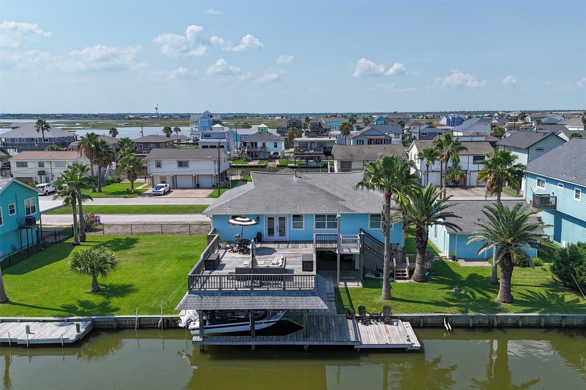 276 Barracuda Street, Bayou Vista, TX 77563 Wow doesnt begin to describe this stunning property, perfectly positioned on a rare three-lot opportunity in Bayou Vista. Expansive water views, spacious outdoor living, and endless possibilities make this a truly exceptional find