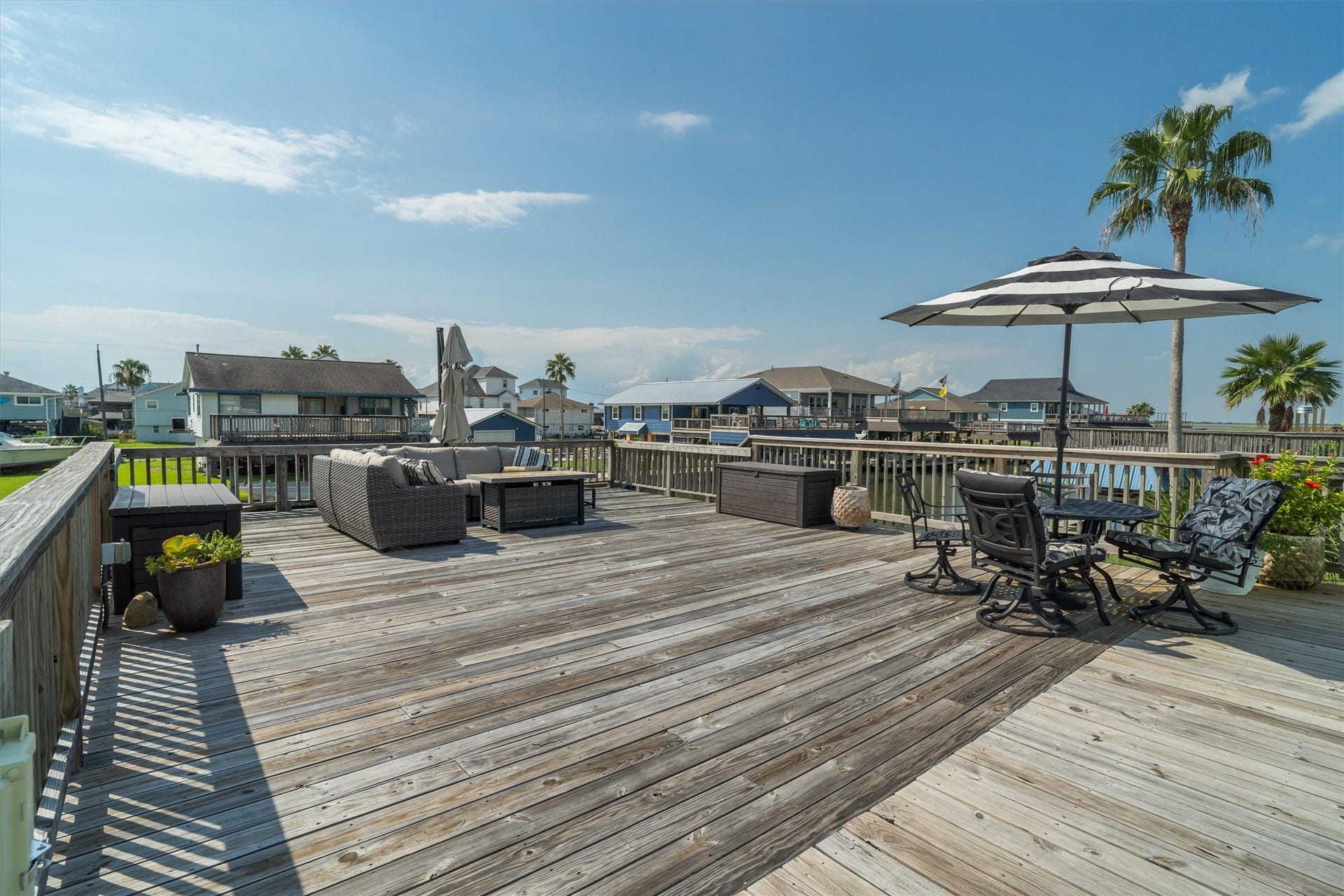 276 Barracuda Street, Bayou Vista, TX 77563 The large upper party deck is perfect for entertaining, outdoor dining, relaxing with friends, or enjoying water views. This versatile space invites gatherings, celebrations, and peaceful moments in the open air