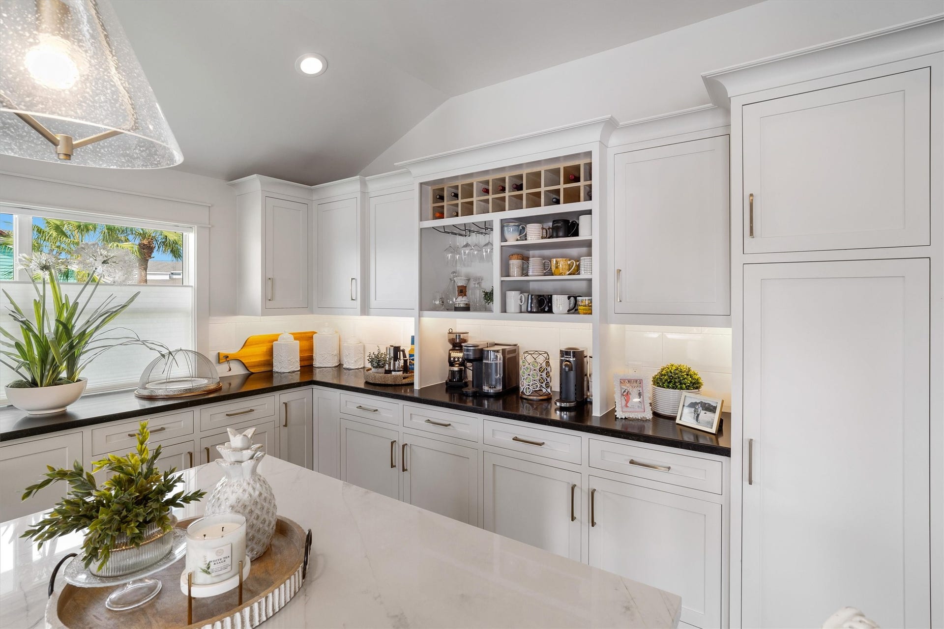 276 Barracuda Street, Bayou Vista, TX 77563 The custom white cabinets with stylish contrasting countertops add a modern touch to the kitchen. There is no lack of storage with these soft close cabinets and drawers