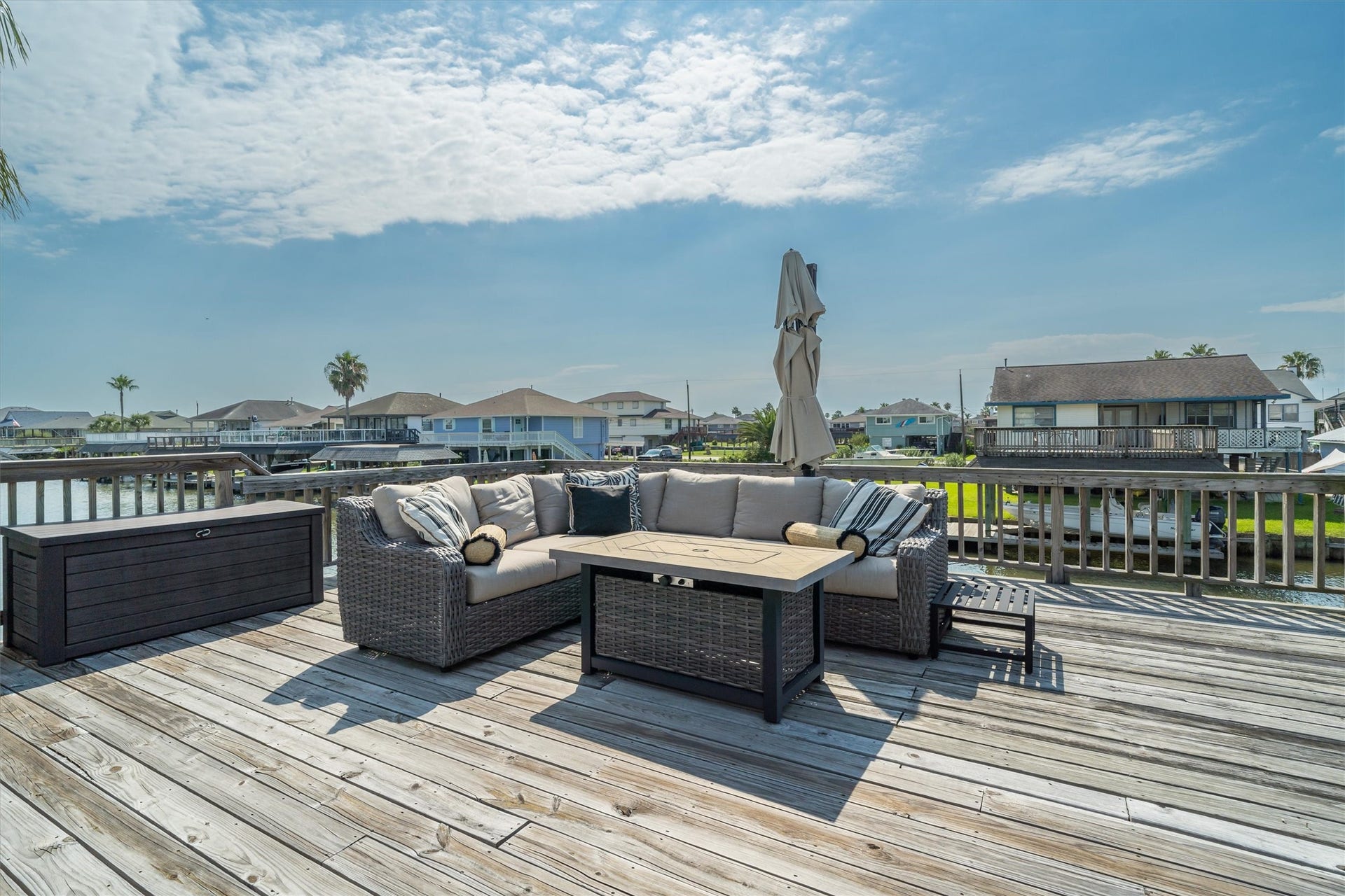 276 Barracuda Street, Bayou Vista, TX 77563 Host unforgettable parties, enjoy open-air dining, or simply unwind while taking in the beautiful surroundings. This expansive deck is designed for entertaining, offering a versatile space where memories are made and every occasion feels special