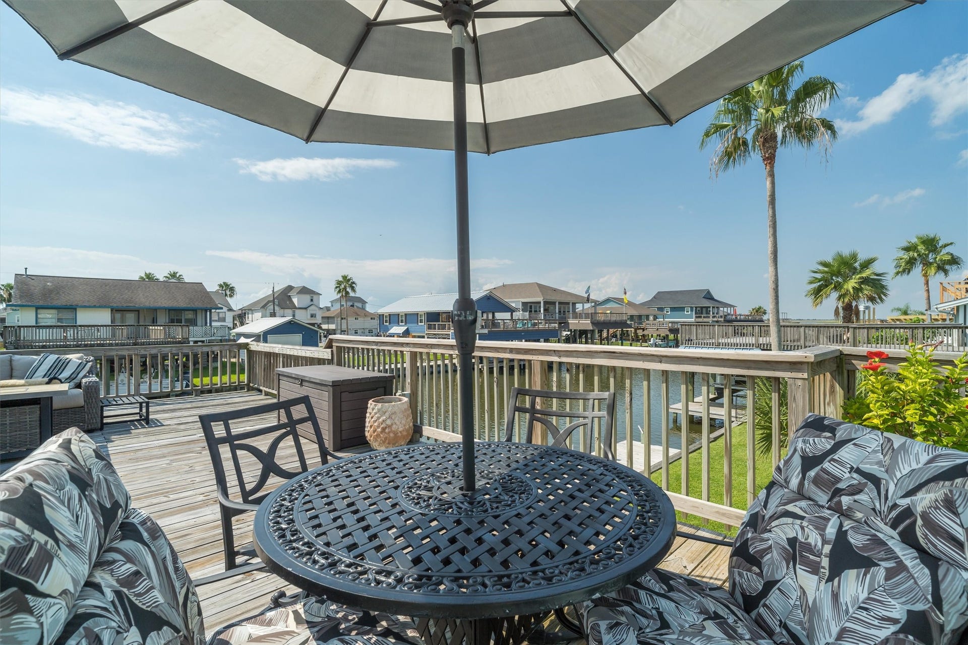 276 Barracuda Street, Bayou Vista, TX 77563 Enjoy unforgettable dinners on the spacious upper party deck, where open-air dining and beautiful views create the perfect setting for evening gatherings