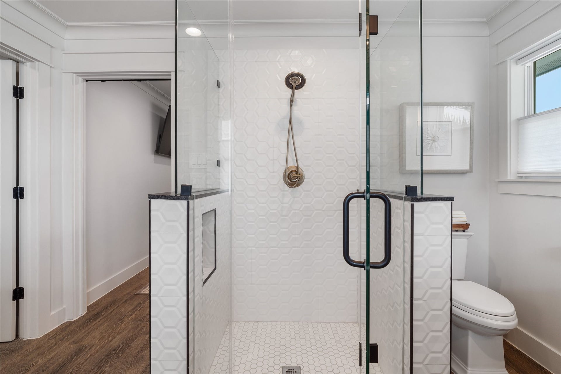 276 Barracuda Street, Bayou Vista, TX 77563 Custom-designed oversized walk-in shower featuring sleek tile work, glass enclosure, and a spacious spa-inspired design that brings both luxury and comfort to everyday living