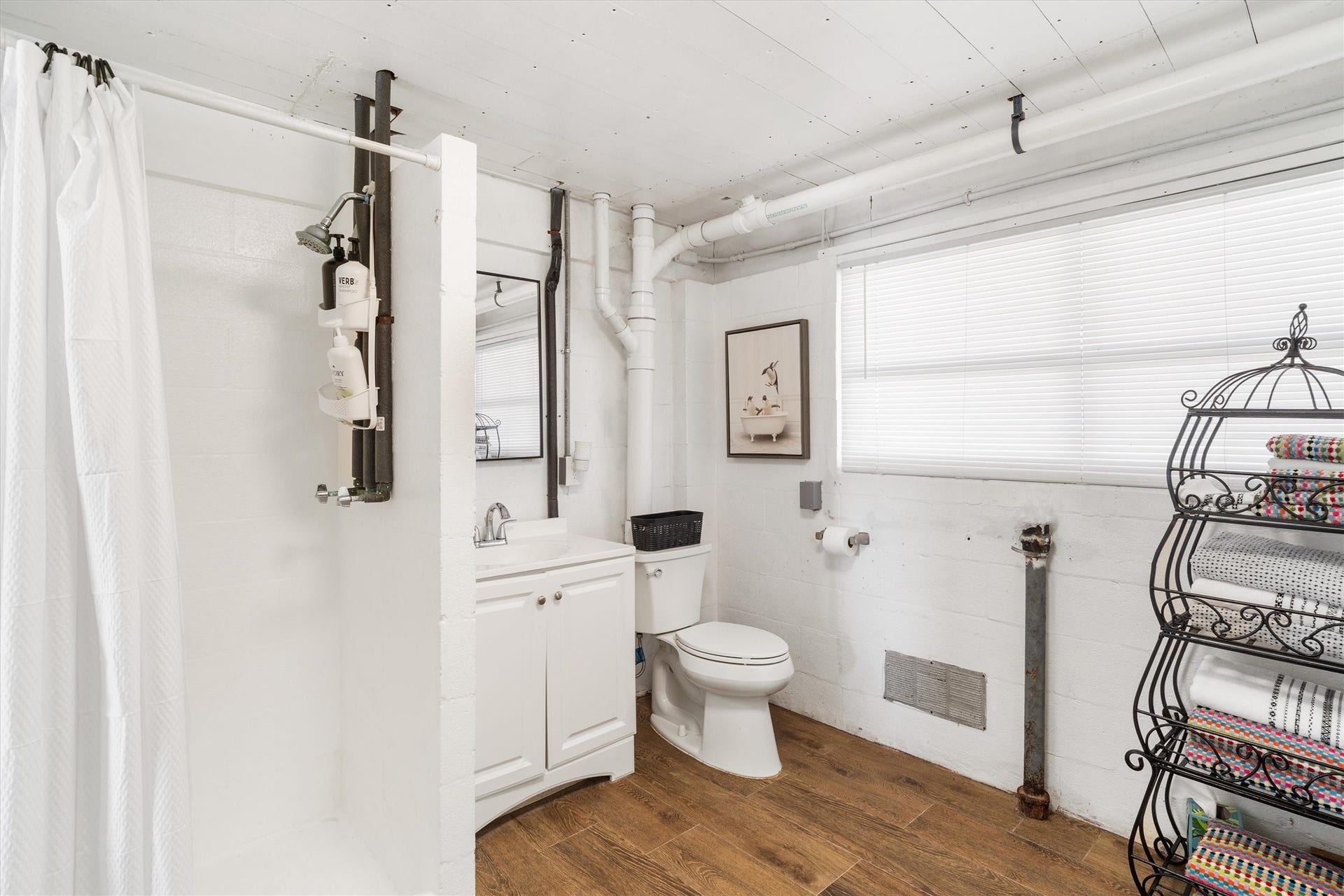 276 Barracuda Street, Bayou Vista, TX 77563 The downstairs full bathroom is perfect for rinsing off after swimming or boating all day. No running upstairs to use the restroom