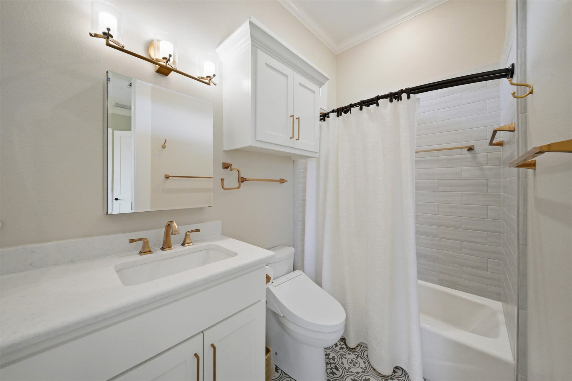 5117 Inverness Drive, Bryan, TX 77802 En suite bath featuring custom cabinetry, stylish fixtures and tub/shower combination.