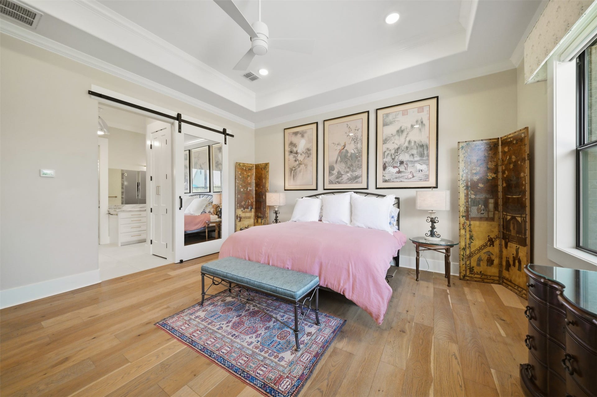 5117 Inverness Drive, Bryan, TX 77802 Spacious primary suite with hardwood floors and private en suite bath.