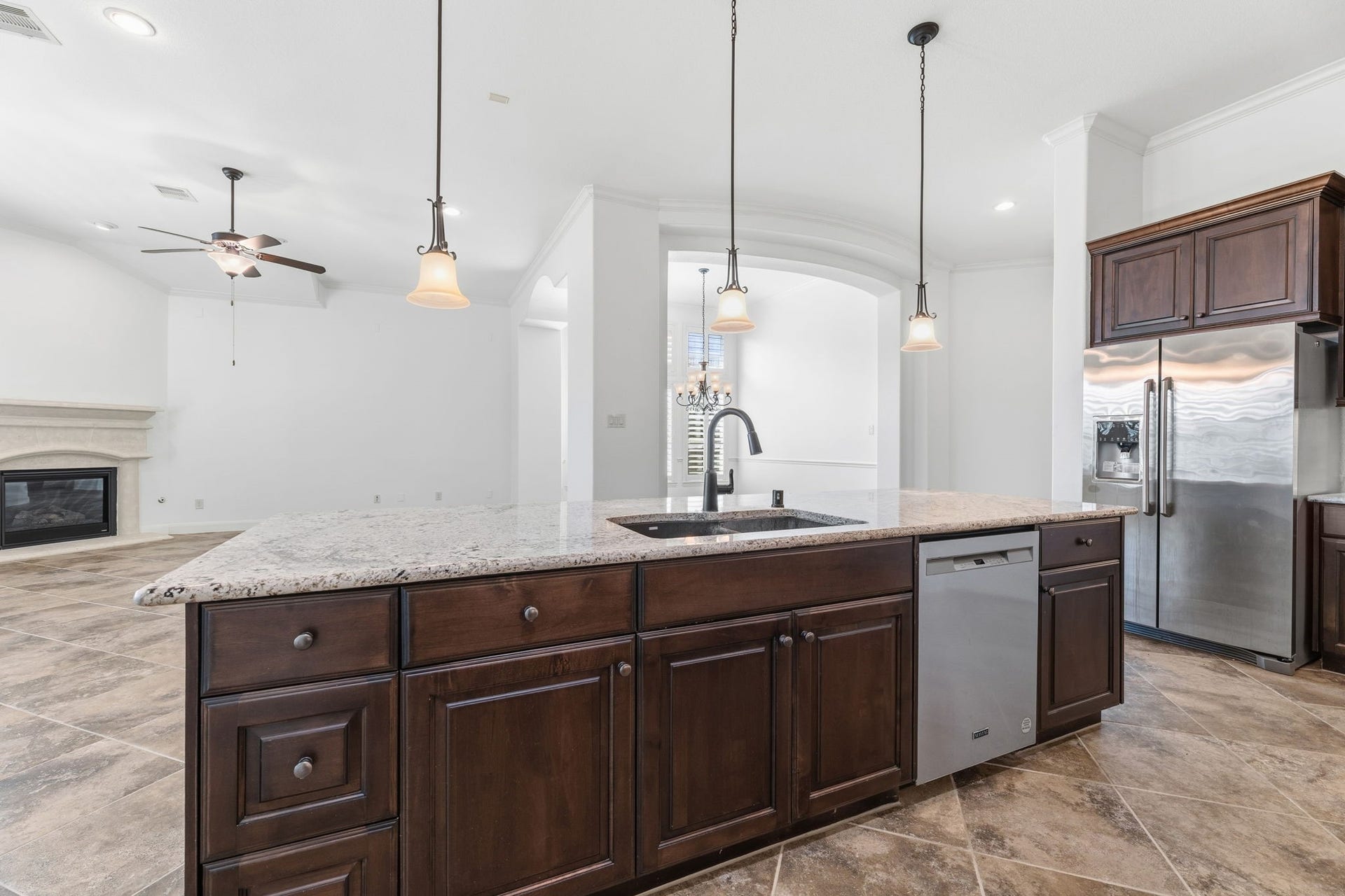 Kitchen sink and dishwasher are in the island.