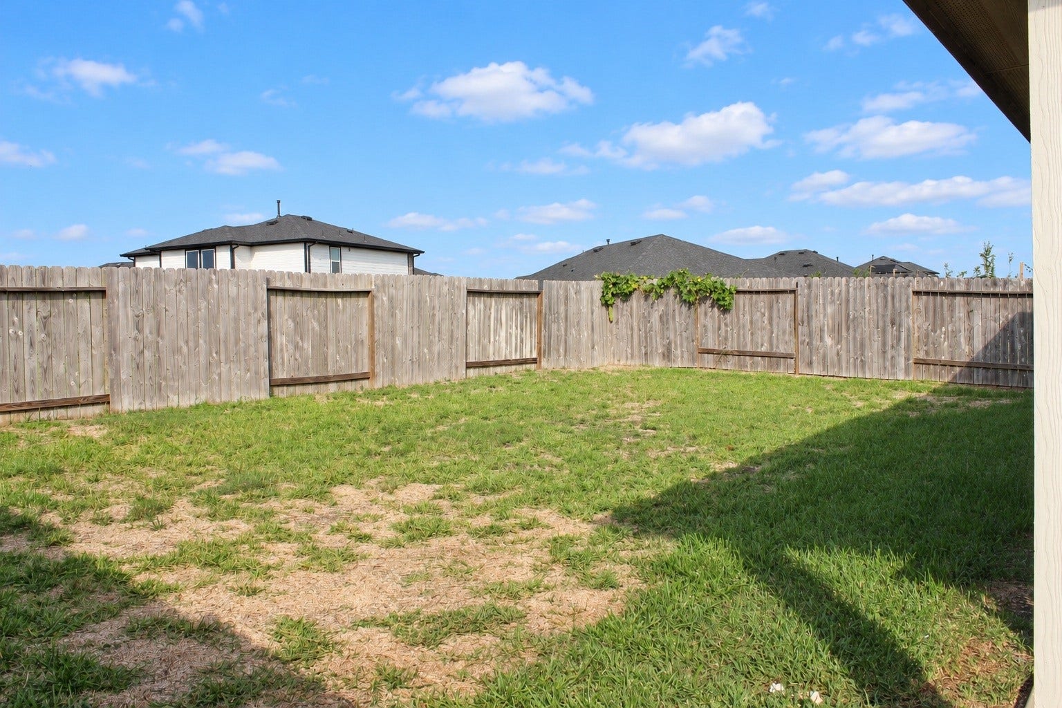 Spacious, Fully Fenced Backyard with Plenty of Room for Outdoor Entertaining and Relaxation