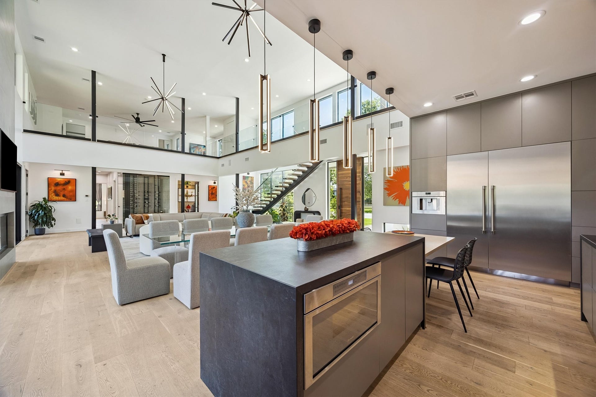 5210 Manor Drive, Sugar Land, TX 77479 A striking oversized island anchors the chef's kitchen, where sophisticated cabinetry, premium appliances, and an open connection to the great room make everyday living and entertaining equally enjoyable.