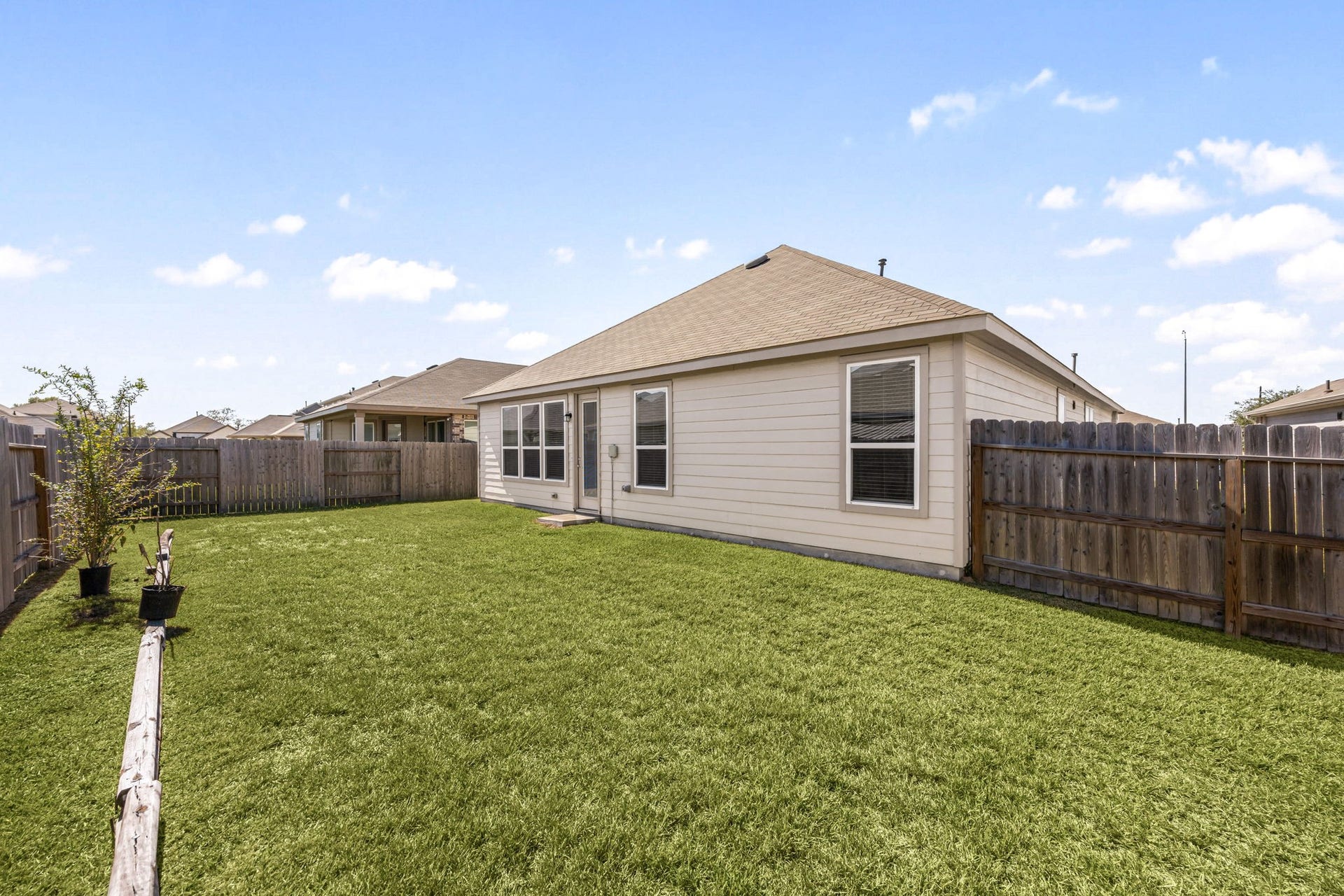 2023 Katalonia Lane, Fresno, TX 77459 Enjoy maximum versatility in this expansive outdoor area. The clear, flat footprint runs deep along both sides of the home, offering an easy layout for added storage sheds, customized garden beds, or a sweeping concrete patio expansion directly off the back doorway.