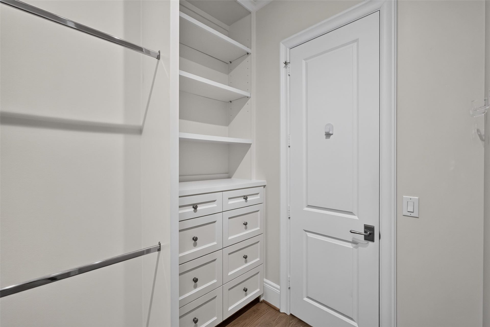 ...with a set of drawers and shelves behind the door