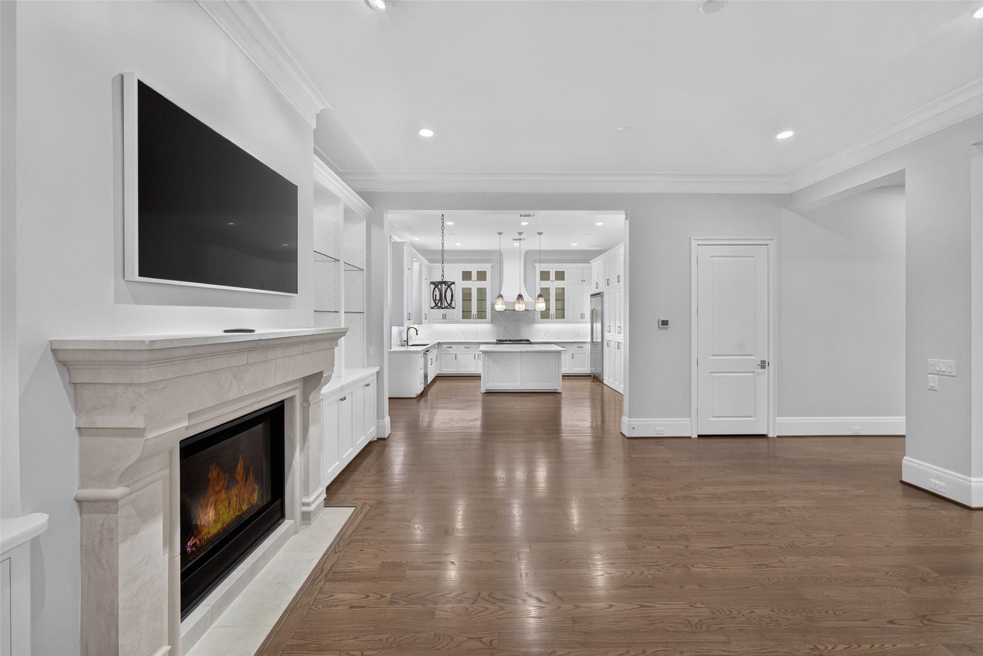 A close-up view of the fireplace! The door you see on the right is the future elevator's closet which is used now for storage.