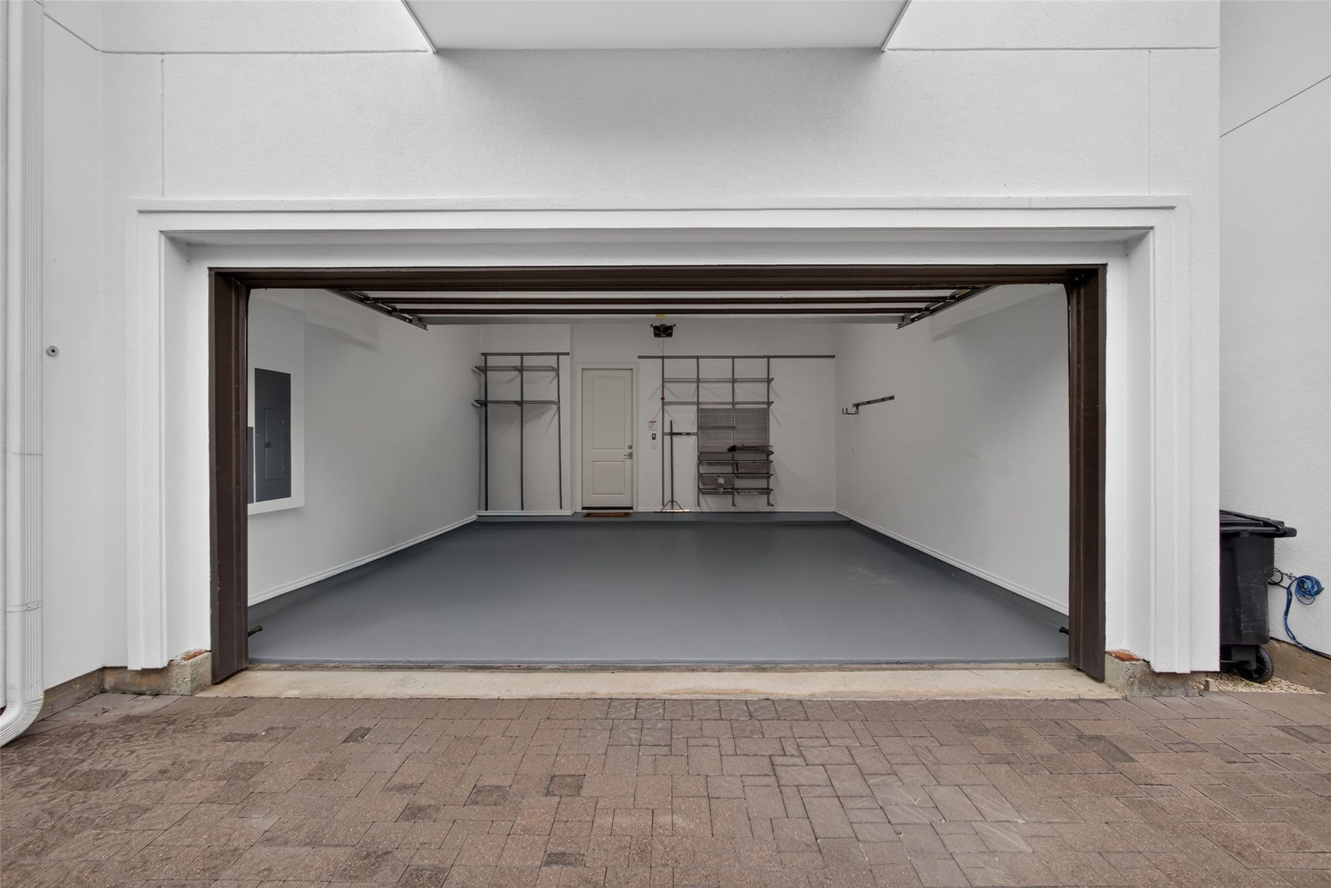 The 2-car garage with epoxy floor