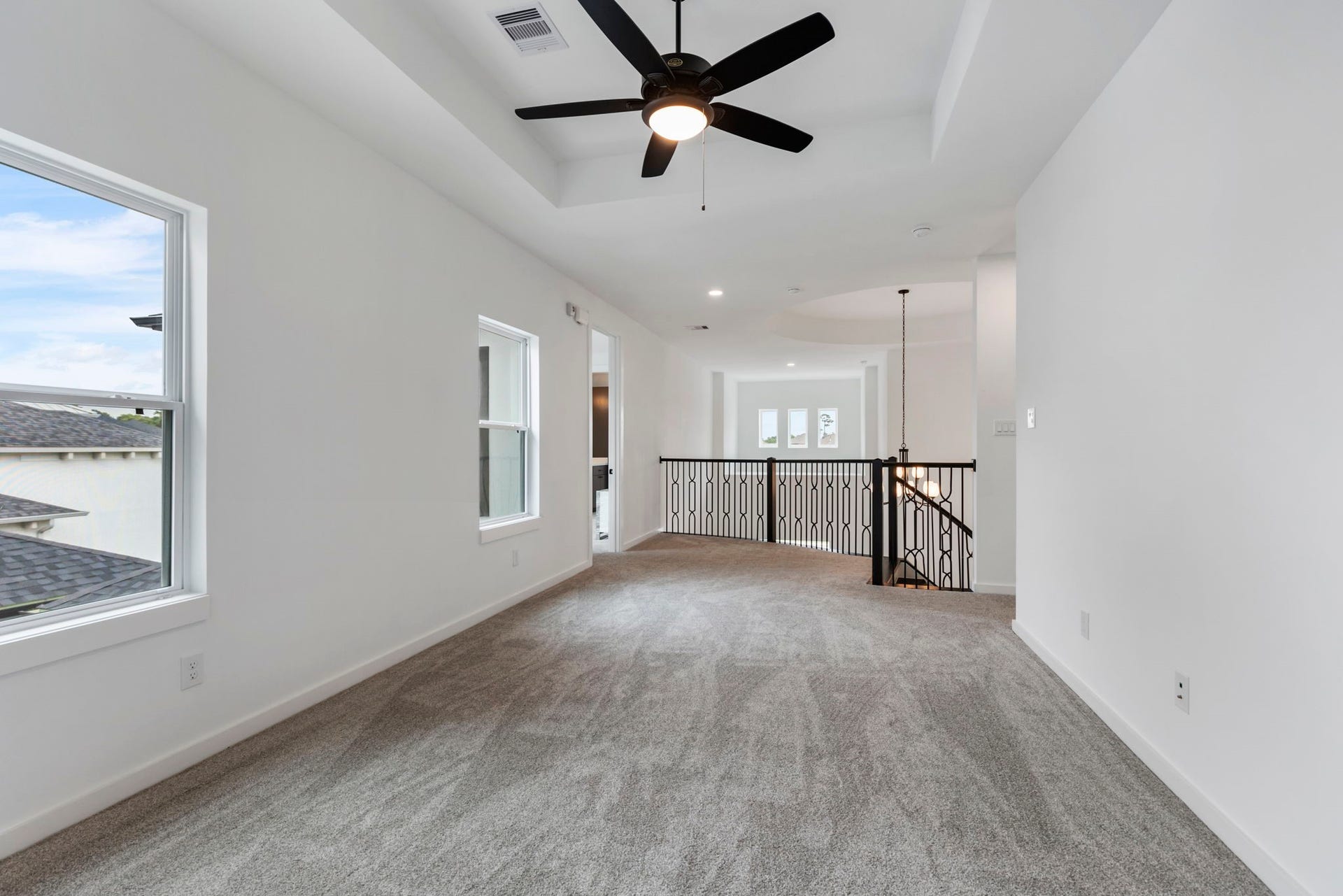 24739 Trull Brook Lane, Spring, TX 77389 Game room on second floor with tray ceilings.