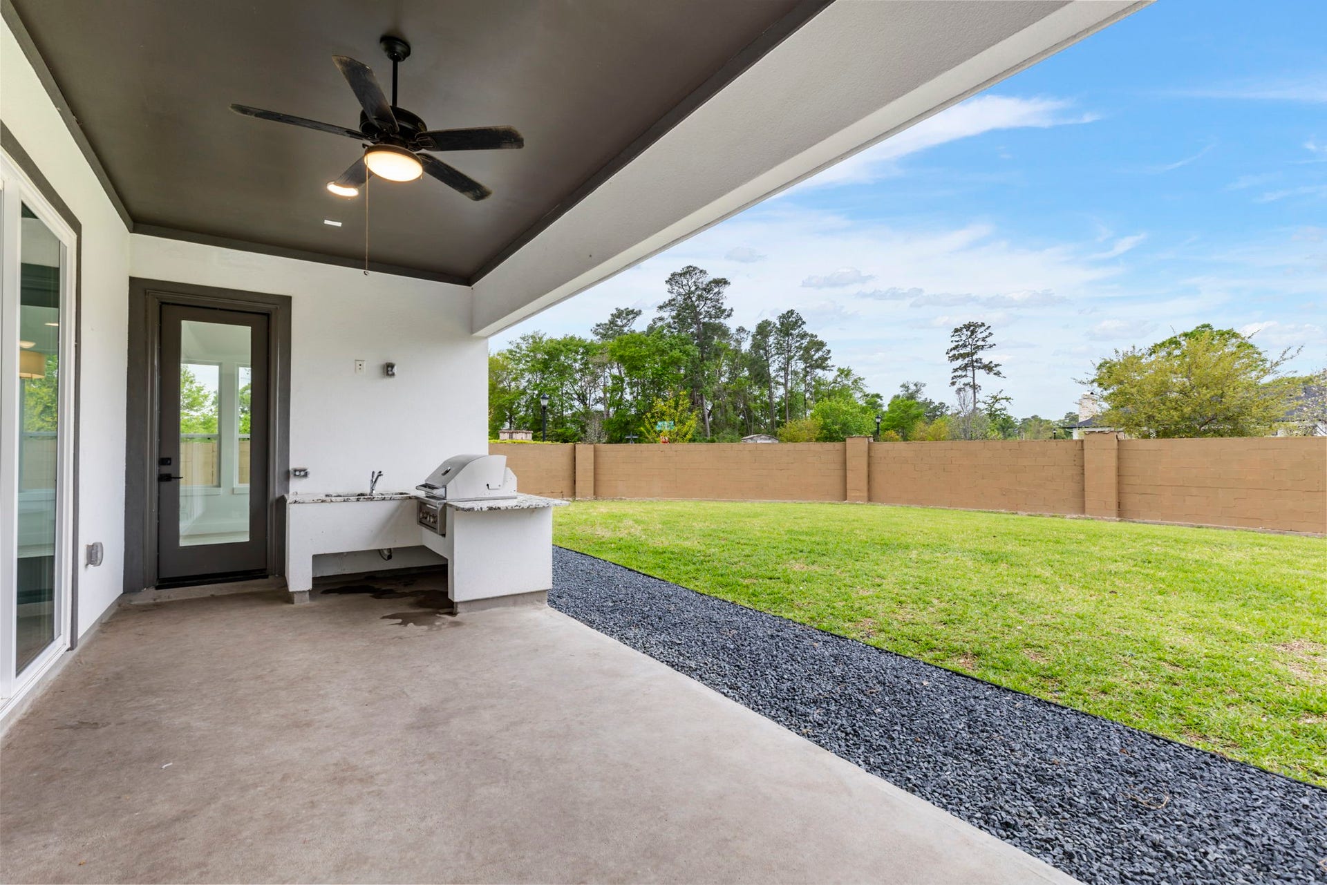 24739 Trull Brook Lane, Spring, TX 77389 Large covered patio.