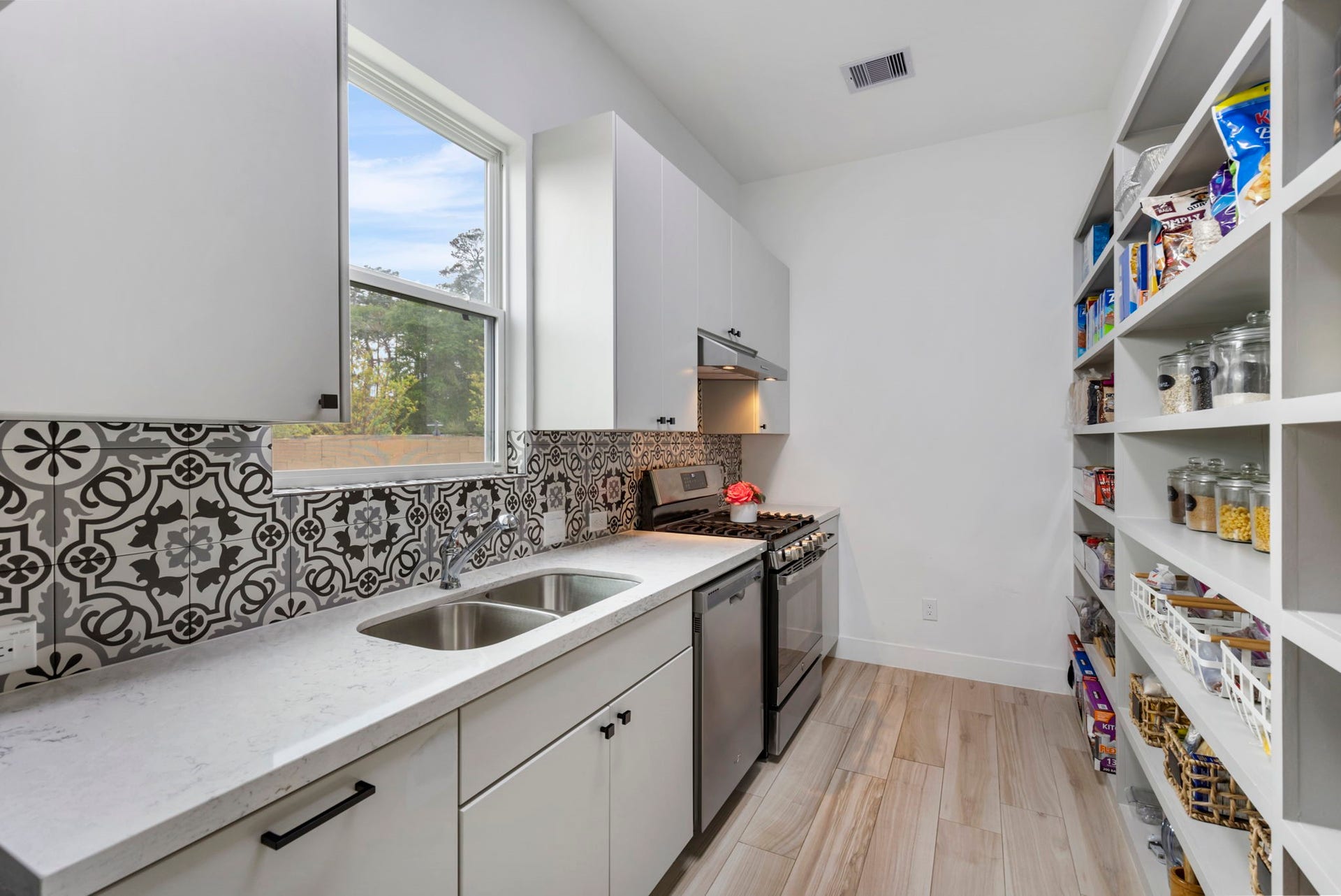 24739 Trull Brook Lane, Spring, TX 77389 Pre-Kitchen equip with sink, gas range and refrigerator.