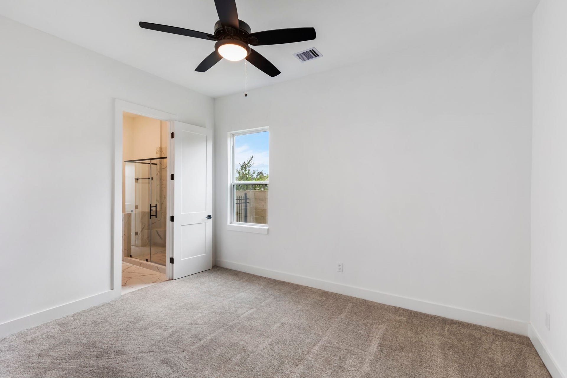 24739 Trull Brook Lane, Spring, TX 77389 Secondary bedroom on first floor with ensuite bathroom.