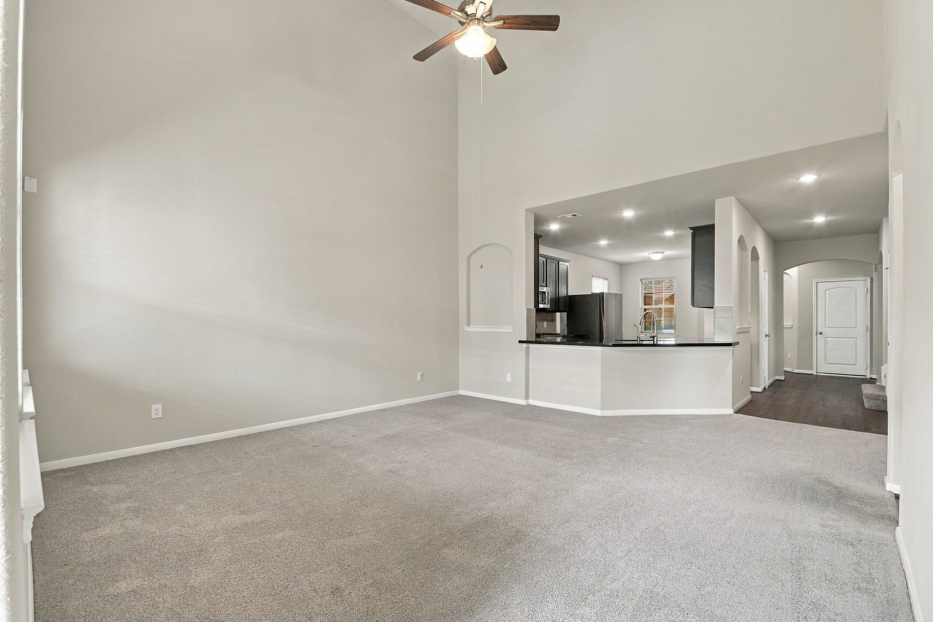 10423 Rochester Hills Lane, Tomball, TX 77375 Living Room looking back towards the entry and kitchen