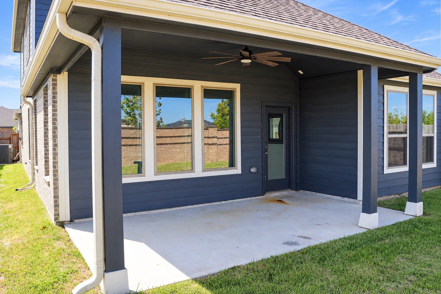 1007 Rosewood Trail, Beasley, TX 77417 The covered back patio provides a comfortable space to relax, enjoy morning coffee, or unwind outdoors, while the backyard offers plenty of room for pets and play.
