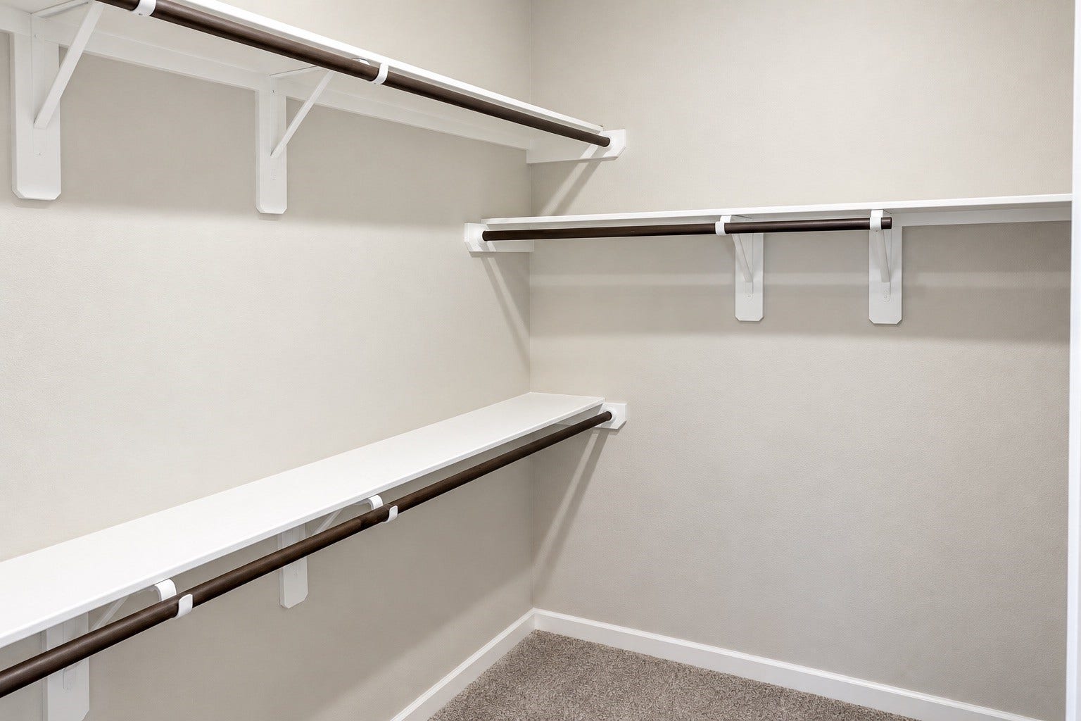 1007 Rosewood Trail, Beasley, TX 77417 Sizable primary walk-in closet featuring ample hanging space and built-in shelving, offering plenty of room for clothing, shoes, and accessories.
