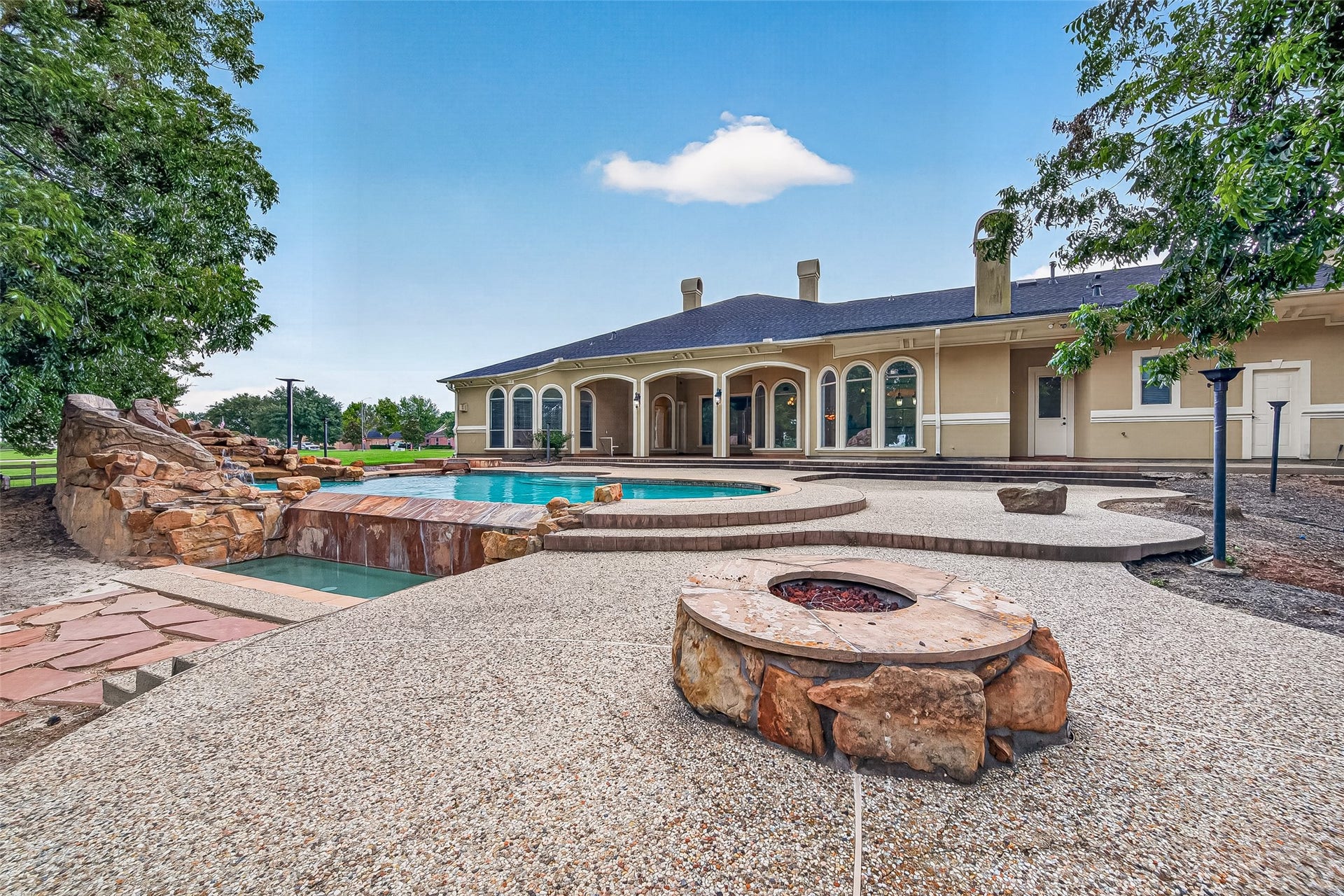 4011 Westerdale Drive, Fulshear, TX 77441 The gas fire pit is perfect for evening fun and making s'mores with family or friends.