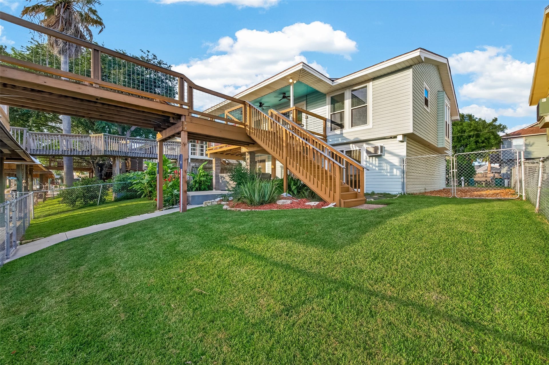 4 N Sandpiper Street, La Marque, TX 77568 Beautifully landscaped backyard retreat!